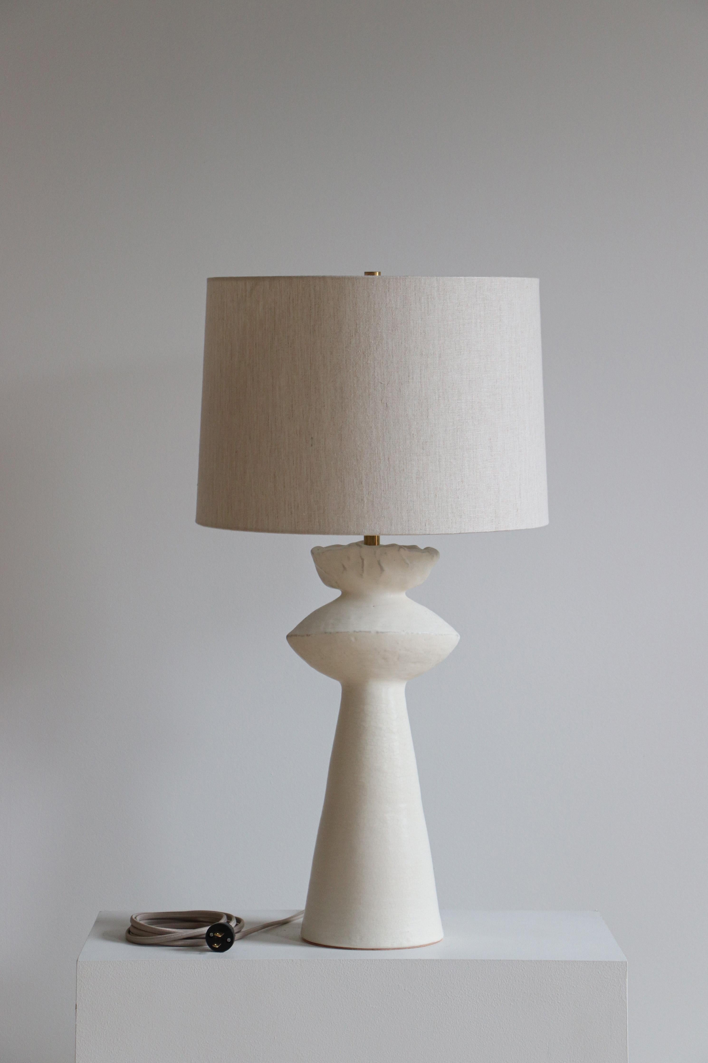 Stone Cicero 30 Table Lamp by Danny Kaplan Studio
Dimensions: ⌀ 41 x H 76 cm
Materials: Glazed Ceramic, Unfinished Brass, Linen

This item is handmade, and may exhibit variability within the same piece. We do our best to maintain a consistent