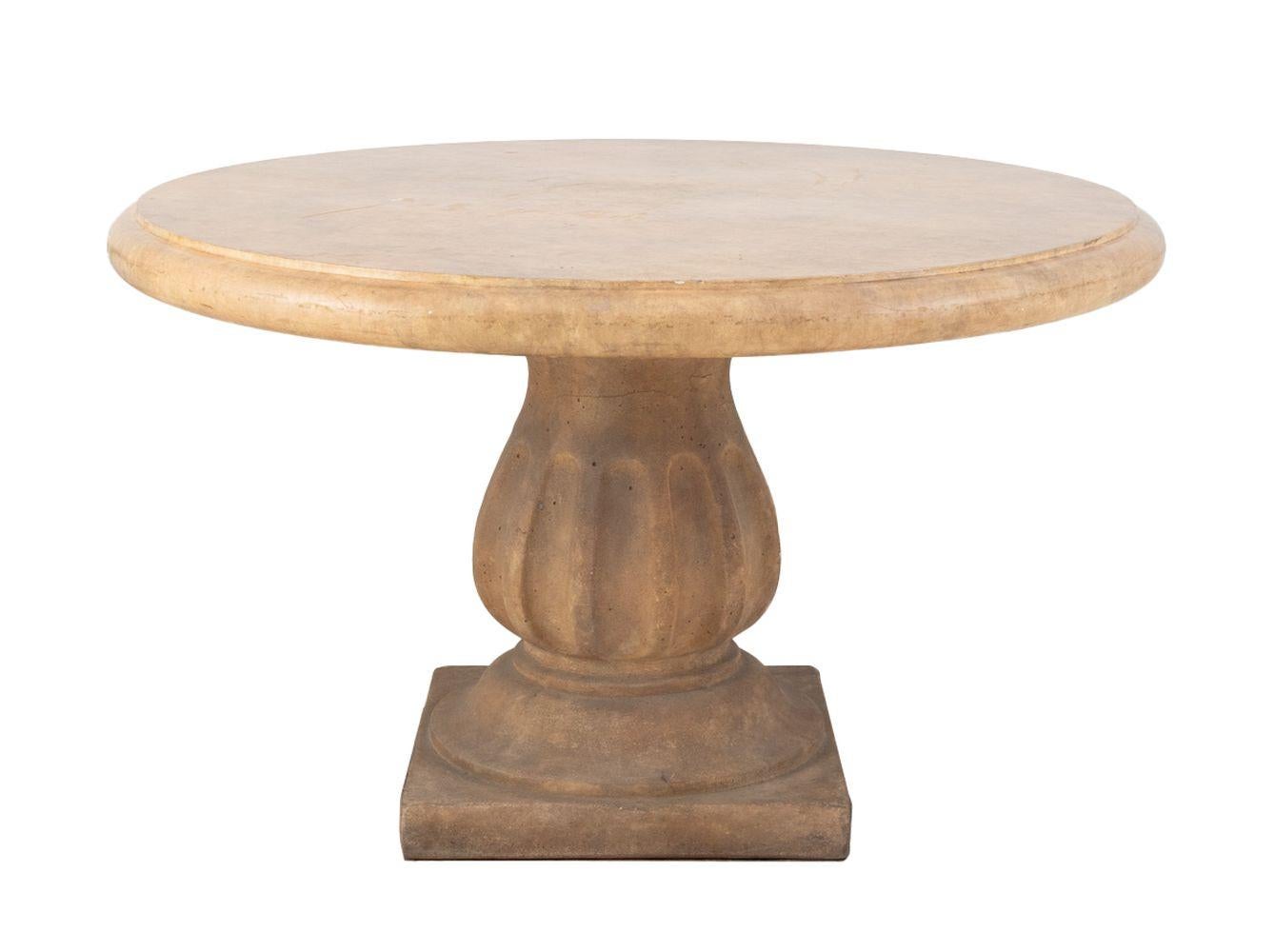 Stone Composite Circular Garden Table, with fluted stem above square base. 29
