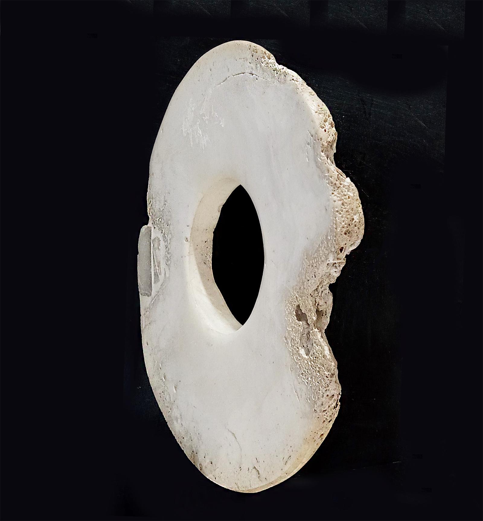 Hand-Carved  Stone Disk from Indonesia, Mounted For Sale