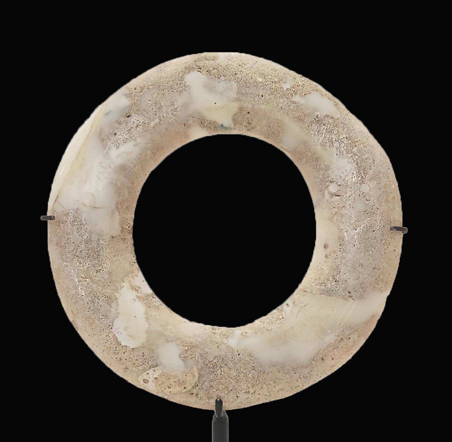 Contemporary  Stone Disk from Indonesia, Mounted For Sale