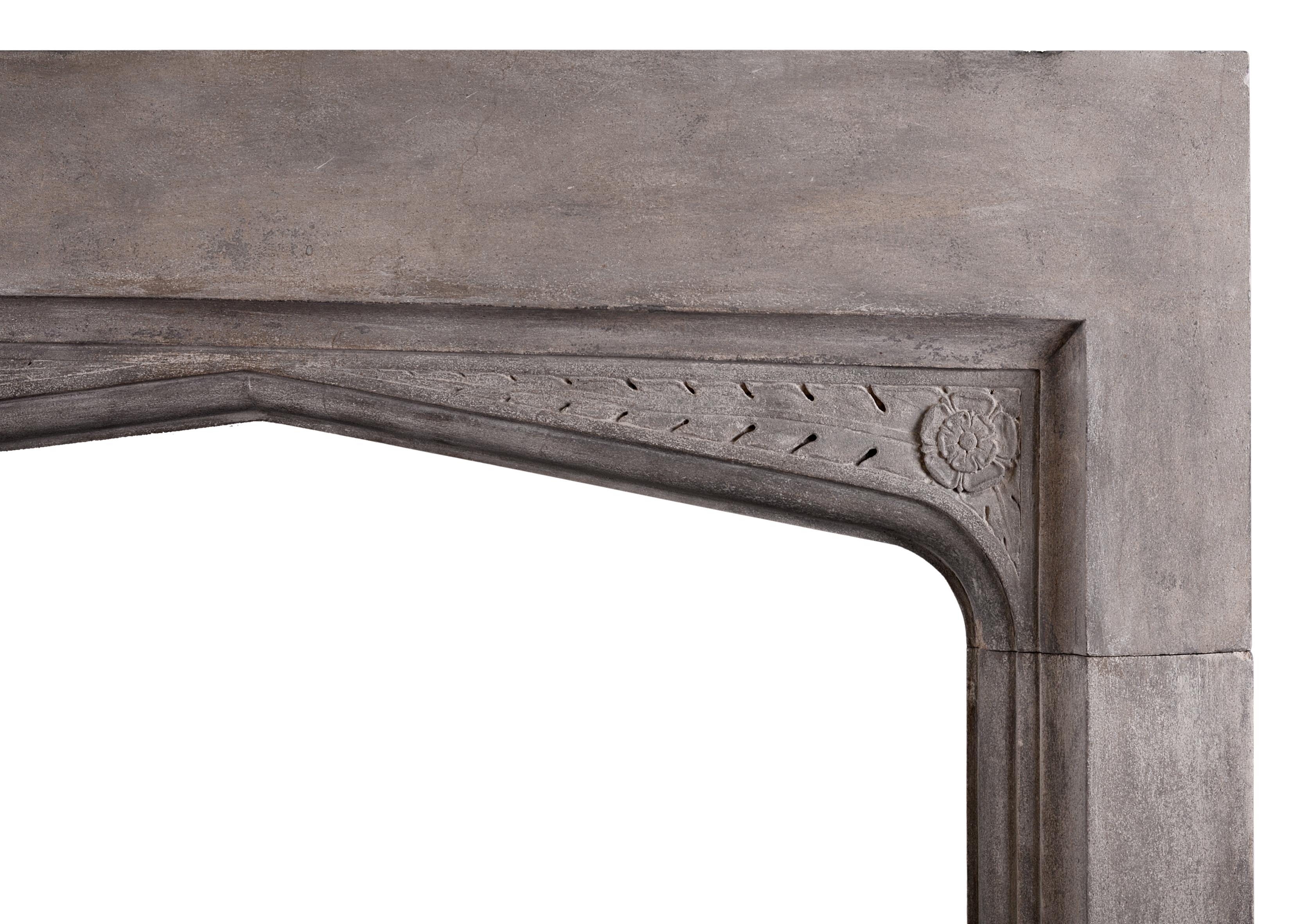 A rustic English stone fireplace in the Gothic manner. The moulded jambs surmounted by arched frieze featuring carved spandrels. English, circa 1900.


Measures: Shelf width 1667 mm 65 ? in
Overall height 1340 mm 52 ¾ in
Opening height 1029 mm