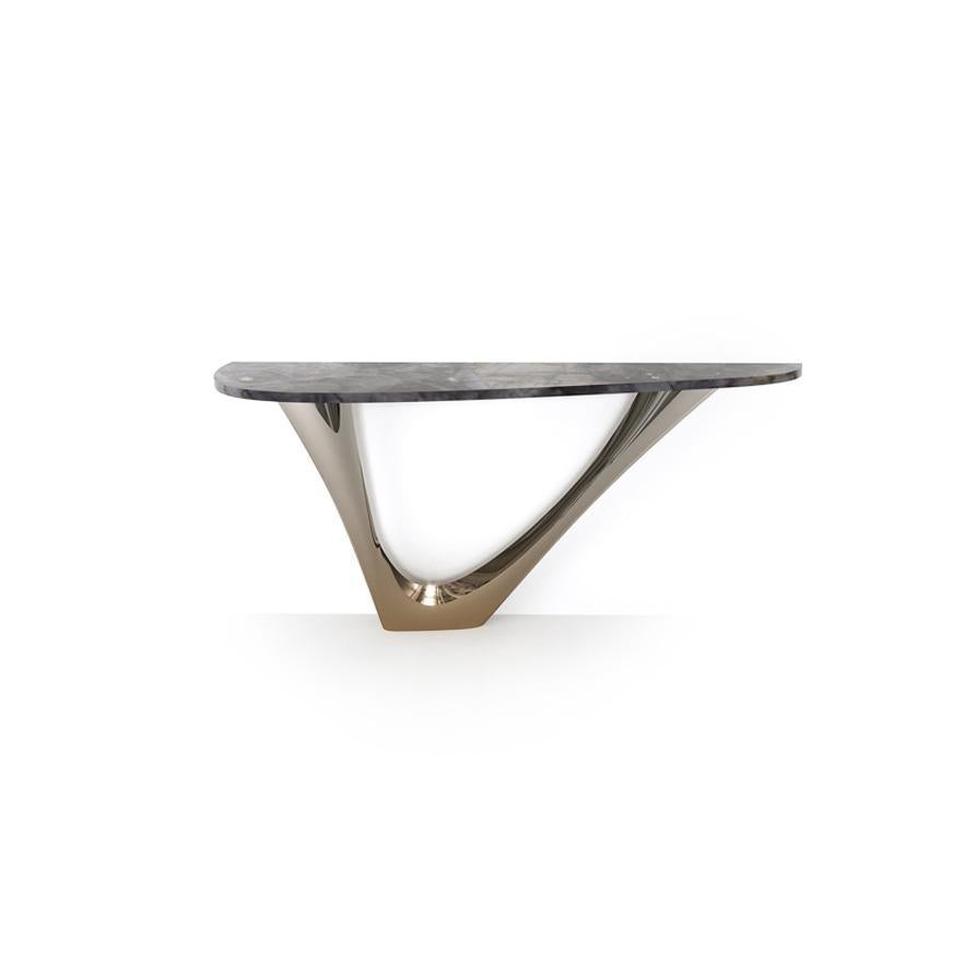 Stone Flamed Gold G-Console Mono by Zieta
Dimensions: D 43 x W 159 x H 75 cm 
Material: Stone top, stainless steel base, carbon steel. 
Finish: Flamed Gold. 
Available colors: Flamed Gold or Cosmic Blue. Also available in concrete, stainless steel,