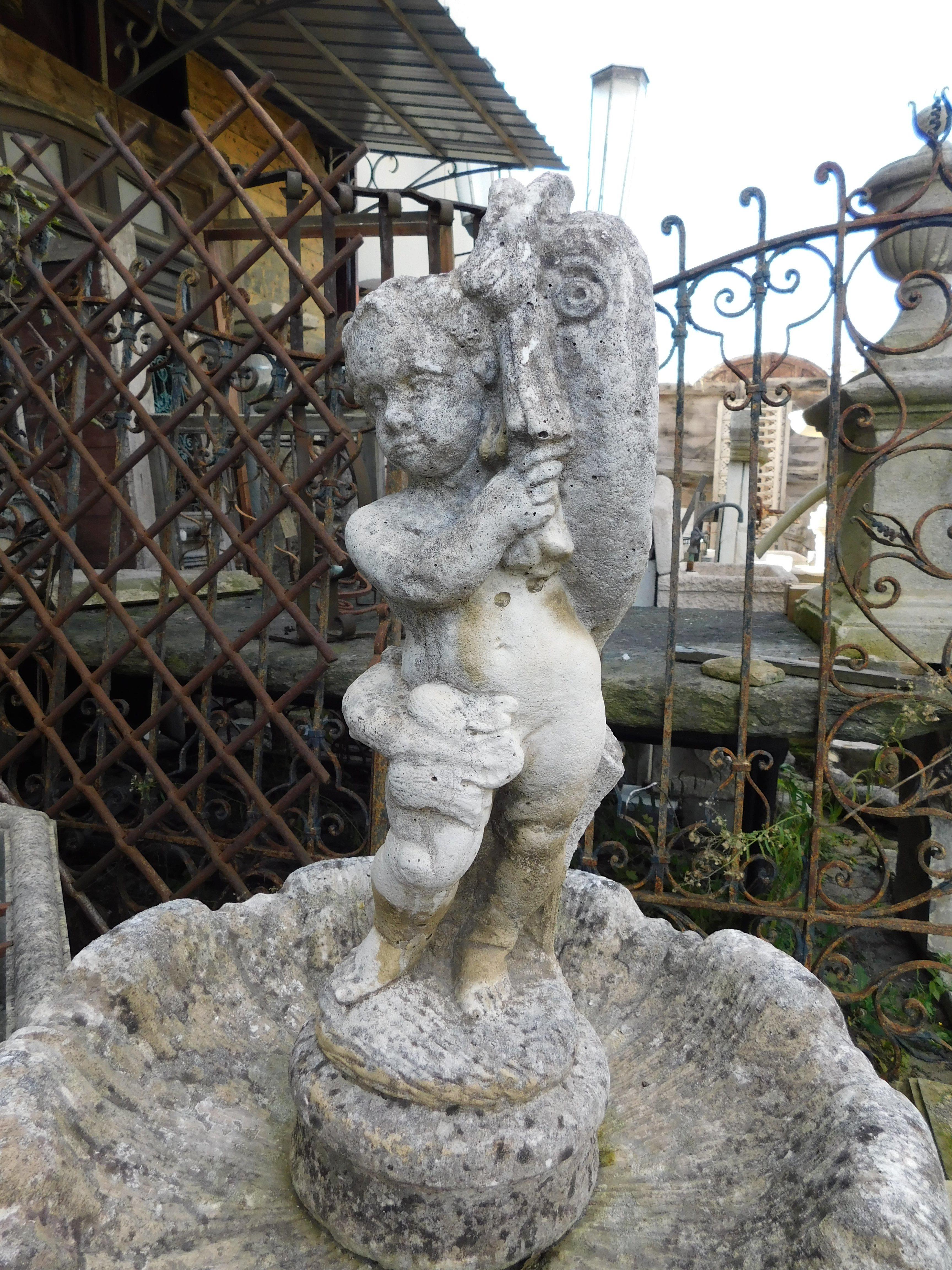 Hand-Carved stone garden fountain with carved putto, Italy For Sale