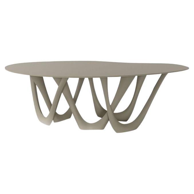 Steingrauer skulpturaler G-Table aus Stahl von Zieta im Angebot