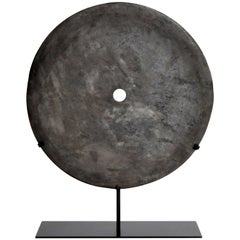 Stone Grinding Disk on Metal Stand