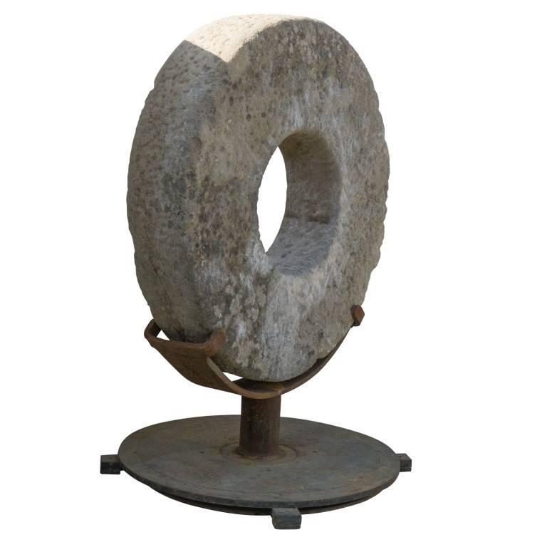 antique grinding stone