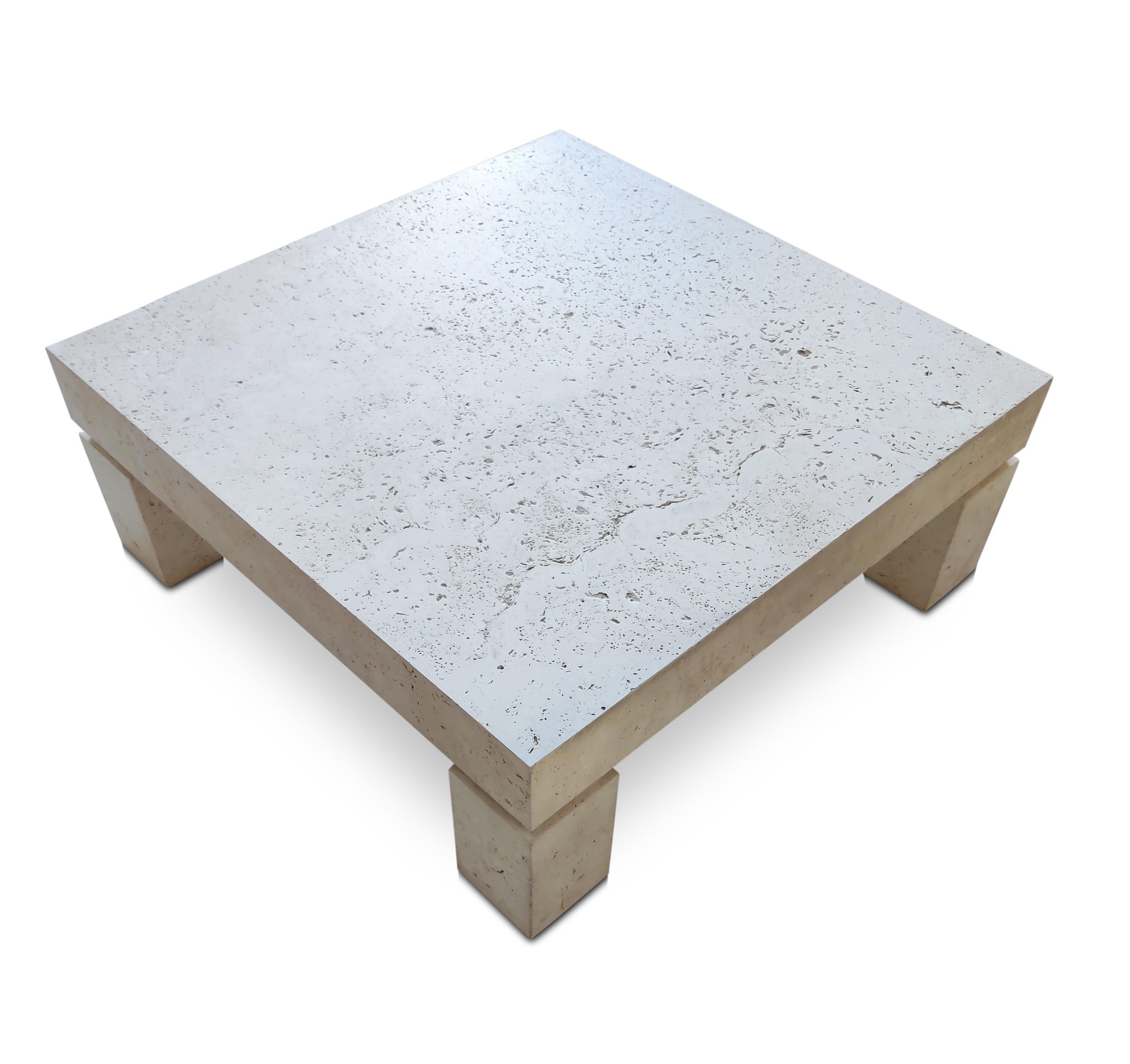 Likely designed and manufactured by Stone International in Italy circa 1980s, this natural travertine coffee table has an amazing presence. The top and legs have a thick and solid-like construction, lending to what I call a Parsons design profile.