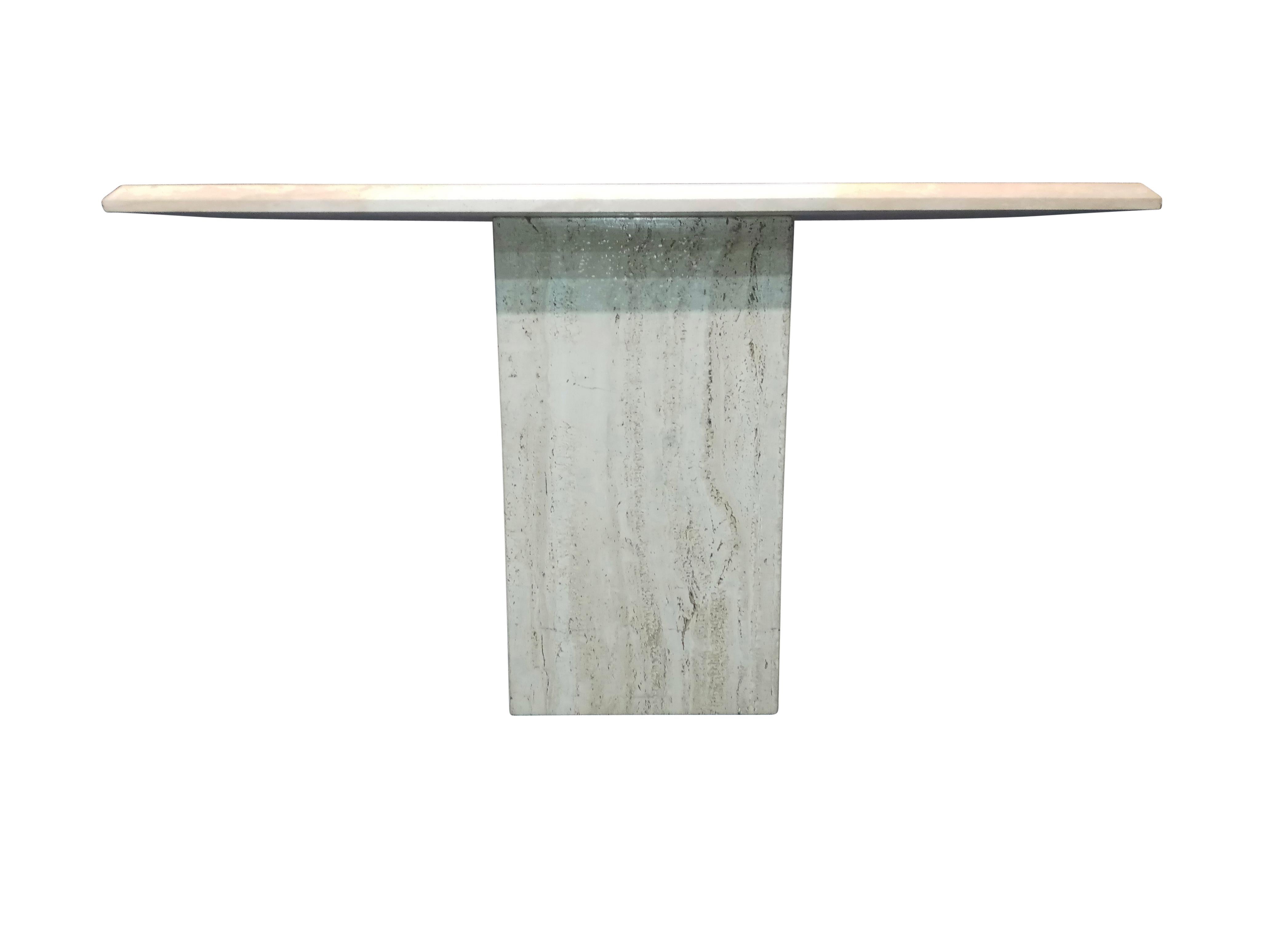 Vintage Italian travertine console table. With polished top on semi-porous base, this bold and practical table can be used in any number of locations in an upscale home. Satin gloss finish makes it perfect for a high-volume area, where you might