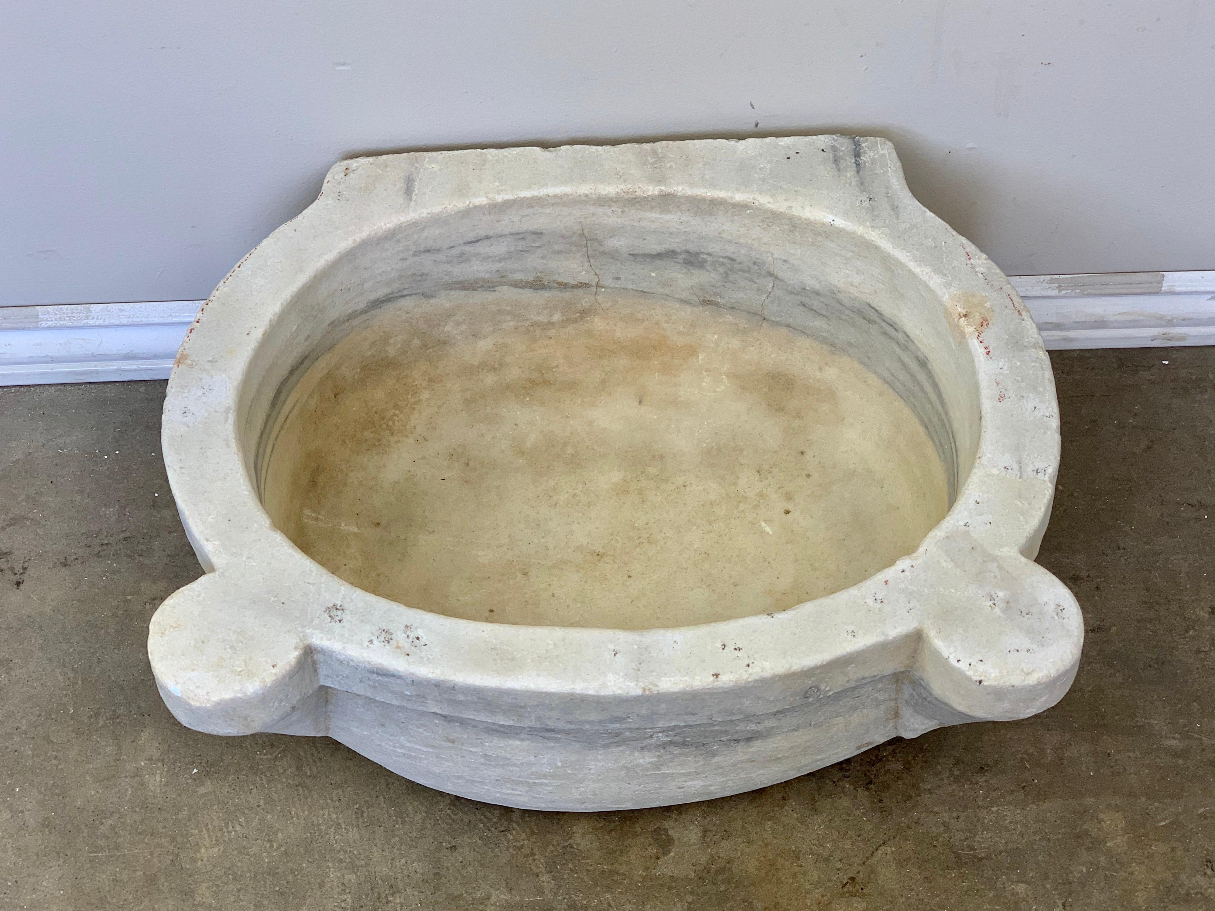 Hand carved Italian stone vessel that would make a great sink.