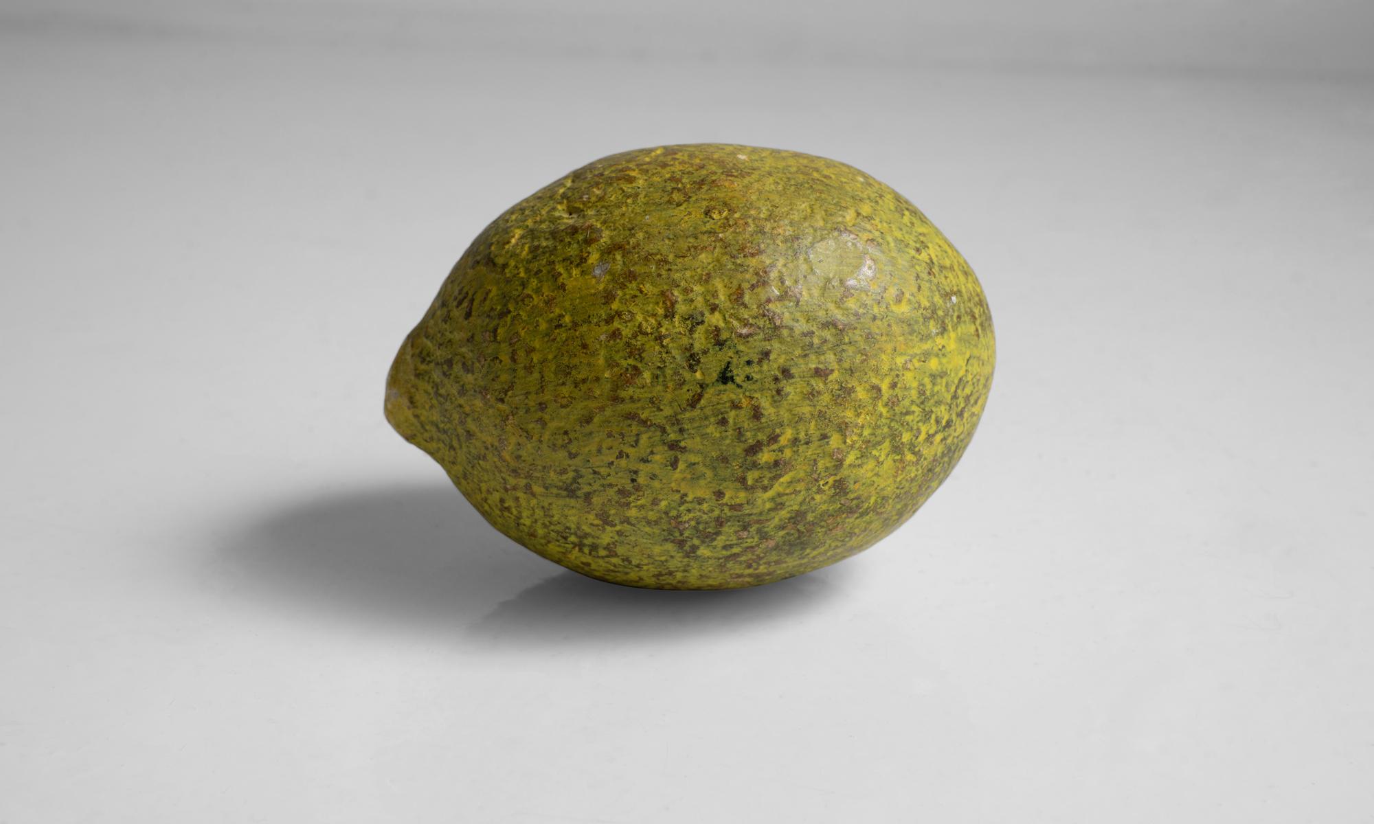 Hand Painted Stone Lemon, America 1960.

For display only, not edible. Skillfully painted.