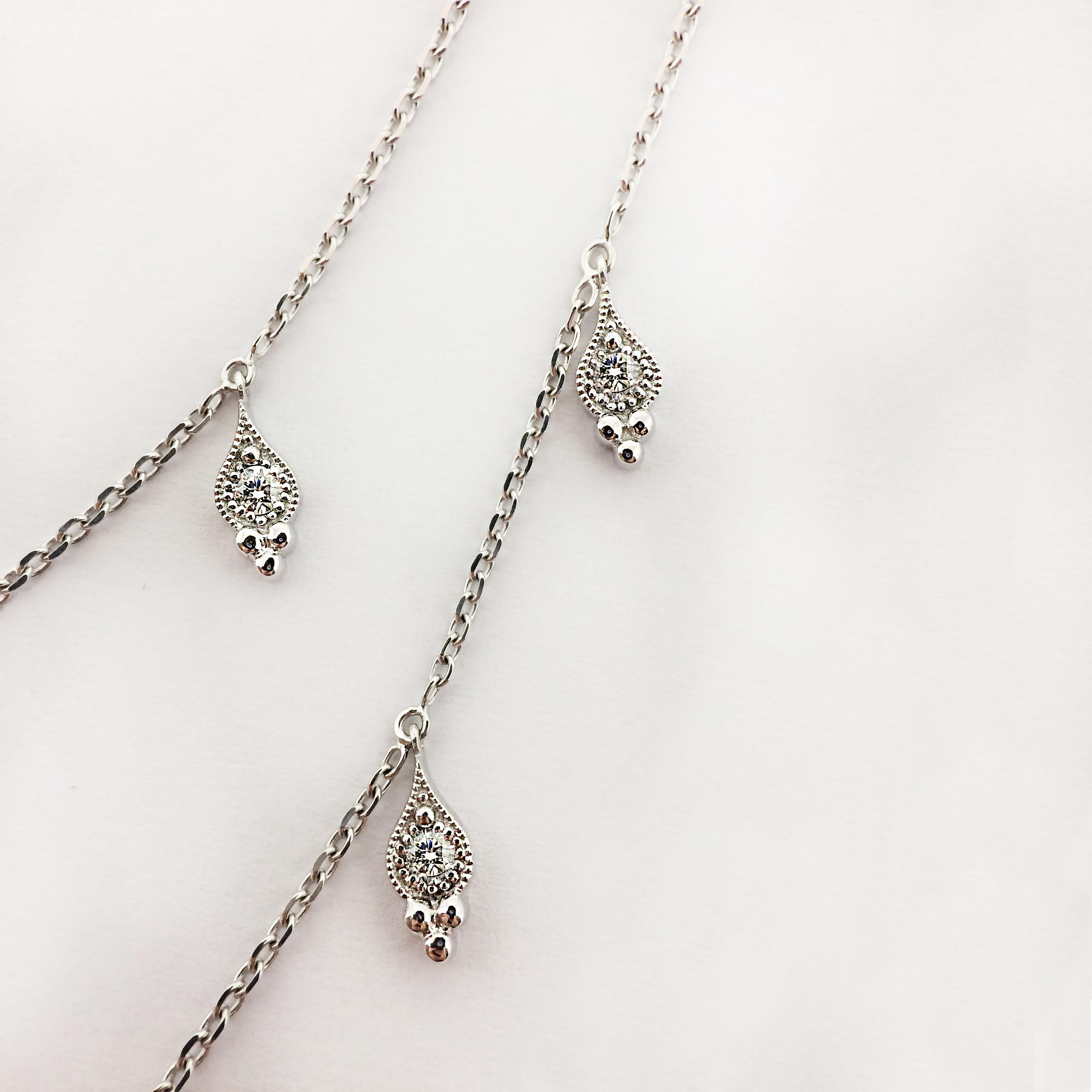 By Stone Paris

Multi-Strand necklace
18-kt white gold 6.40g
15 GVS white diamonds 0.45 ct
Size of the 13 patterns : 0.4 x 0.9 cm
Adjustable length from 40 to 42 cm

This piece is unavailable, it has to be especially handmade with an 8 to 10 weeks