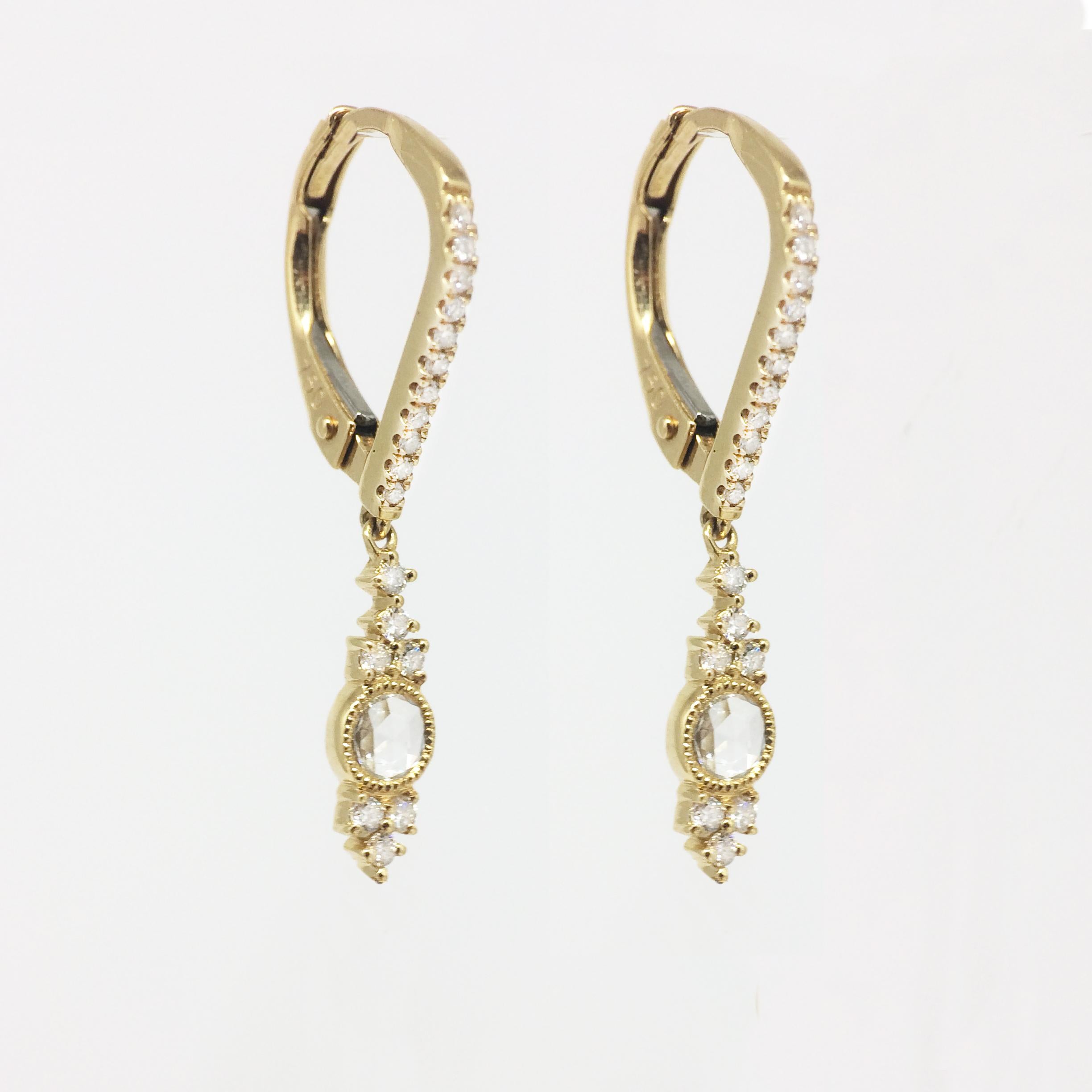 By Stone Paris

Dangle earrings
18-kt yellow gold 1.87g
40 GVS white diamonds 0.29 ct
Dormeuse system - Length : 2.09 cm
Size of the pattern : 1.09 x 0.35 cm

This jewel is also available in white gold, pink gold, and black gold.
For more