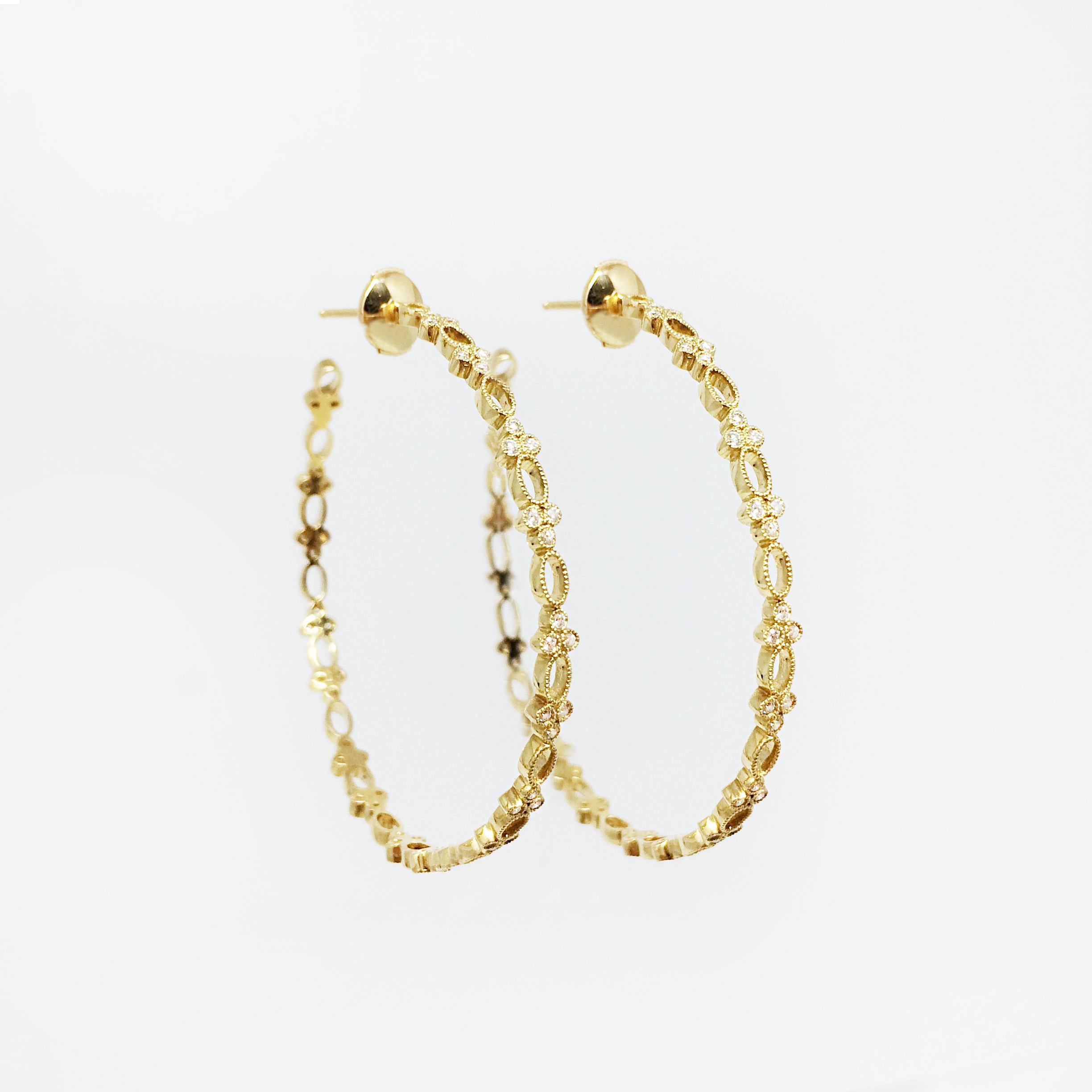 By Stone Paris

Large hoops earrings
18-kt yellow gold 7.70 g
102 GVS white diamonds 0.51 ct
Alpa system - Inner diameter 4.5 cm

This jewel is also available in white gold, pink gold, and black gold.
For more information please contact us.