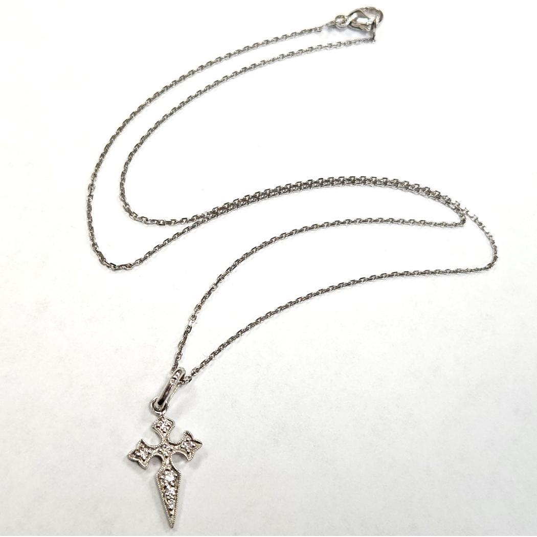 Stone Paris by Marie Poniatowski Diamond Cross Necklace – Blood Diamond Collection

Elegant and rare designer piece from the iconic Blood Diamond collection by Stone Paris, designed by Marie Poniatowski. This necklace features a medieval-inspired