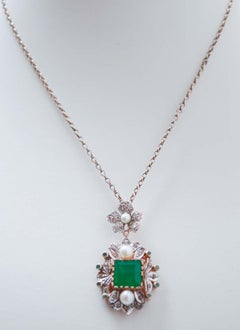 Pietra, perle, smeraldi, diamanti, ciondolo in oro rosa e argento.