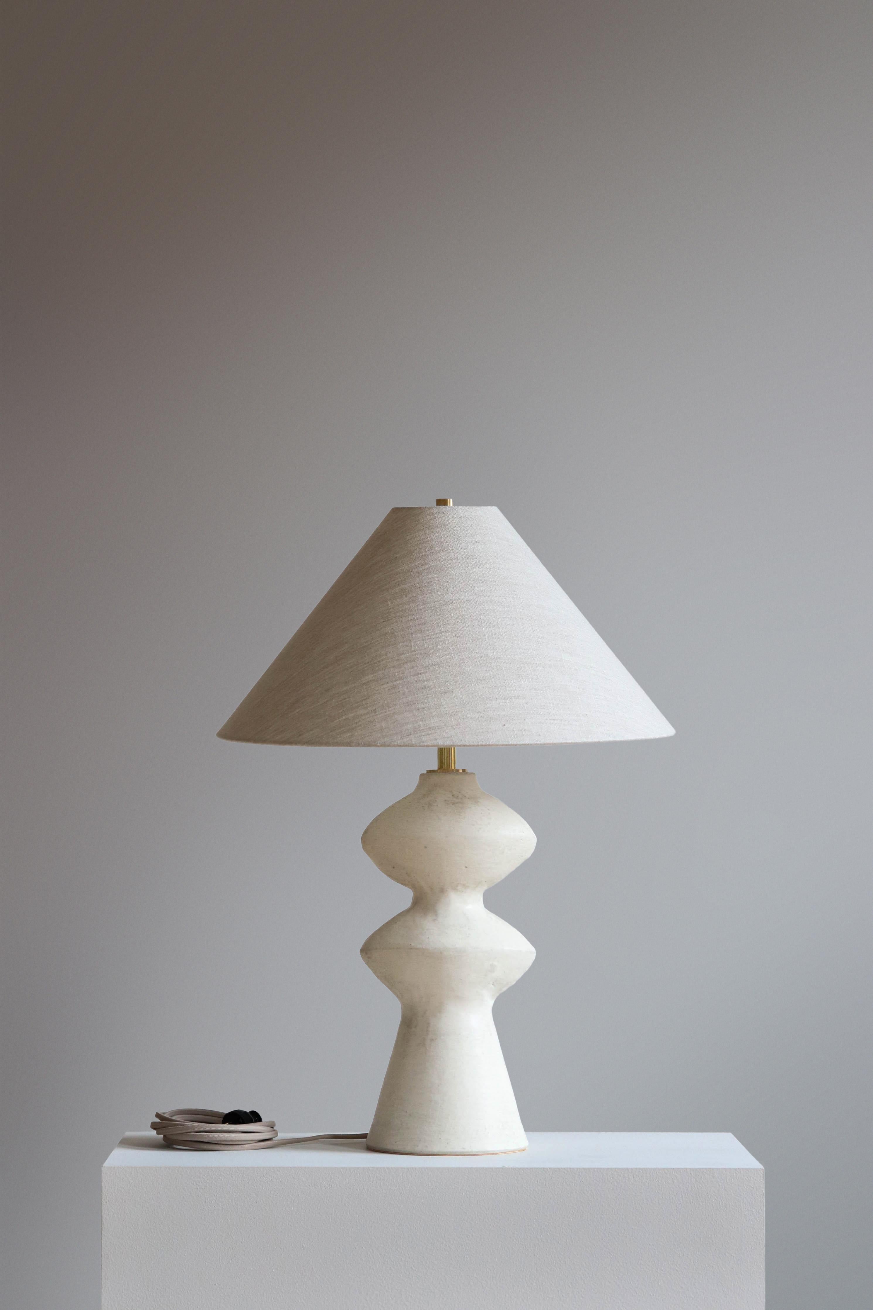 Stone Pollux 25 Table Lamp by Danny Kaplan Studio
Dimensions: ⌀ 45 x H 64 cm
Materials: Glazed Ceramic, Unfinished Brass, Wax Paper

This item is handmade, and may exhibit variability within the same piece. We do our best to maintain a consistent