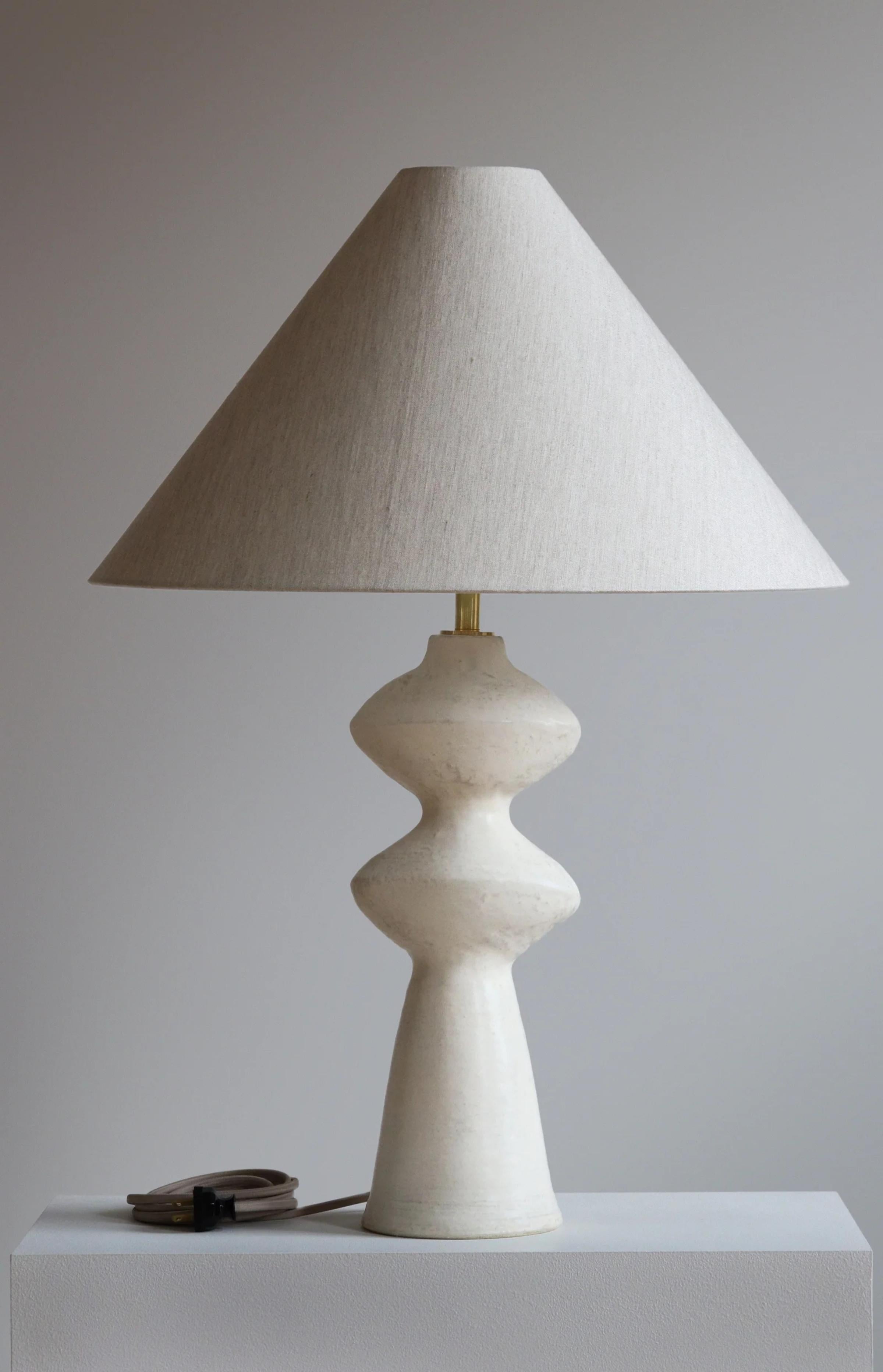 Stone Pollux 32 Table Lamp by Danny Kaplan Studio
Dimensions: ⌀ 56 x H 82 cm
Materials: Glazed Ceramic, Unfinished Brass, Wax Paper

This item is handmade, and may exhibit variability within the same piece. We do our best to maintain a consistent