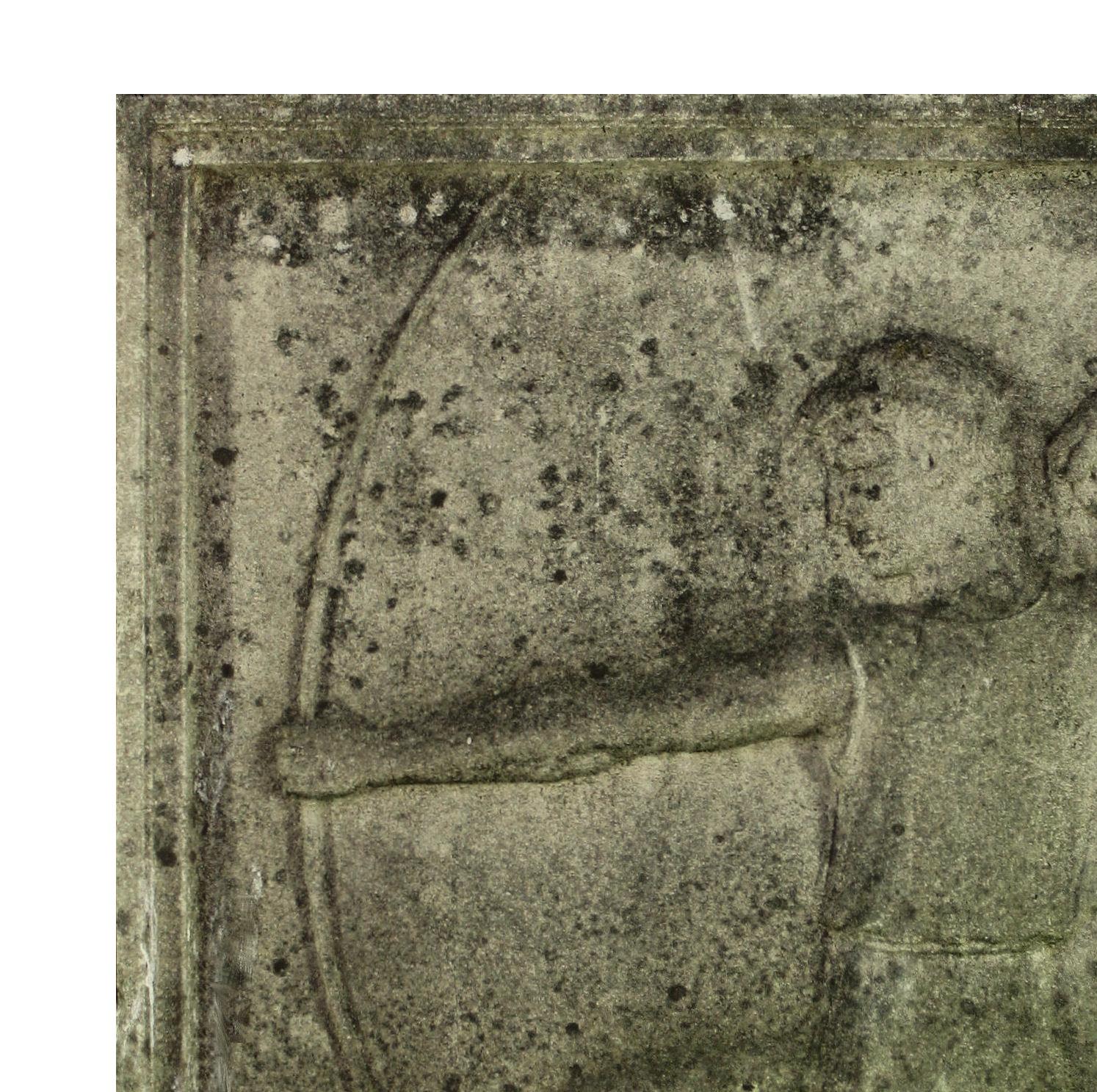 An English stone relief plaque depicting a classical Archer.