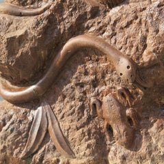 Stone Sculpture of Snake and Frog