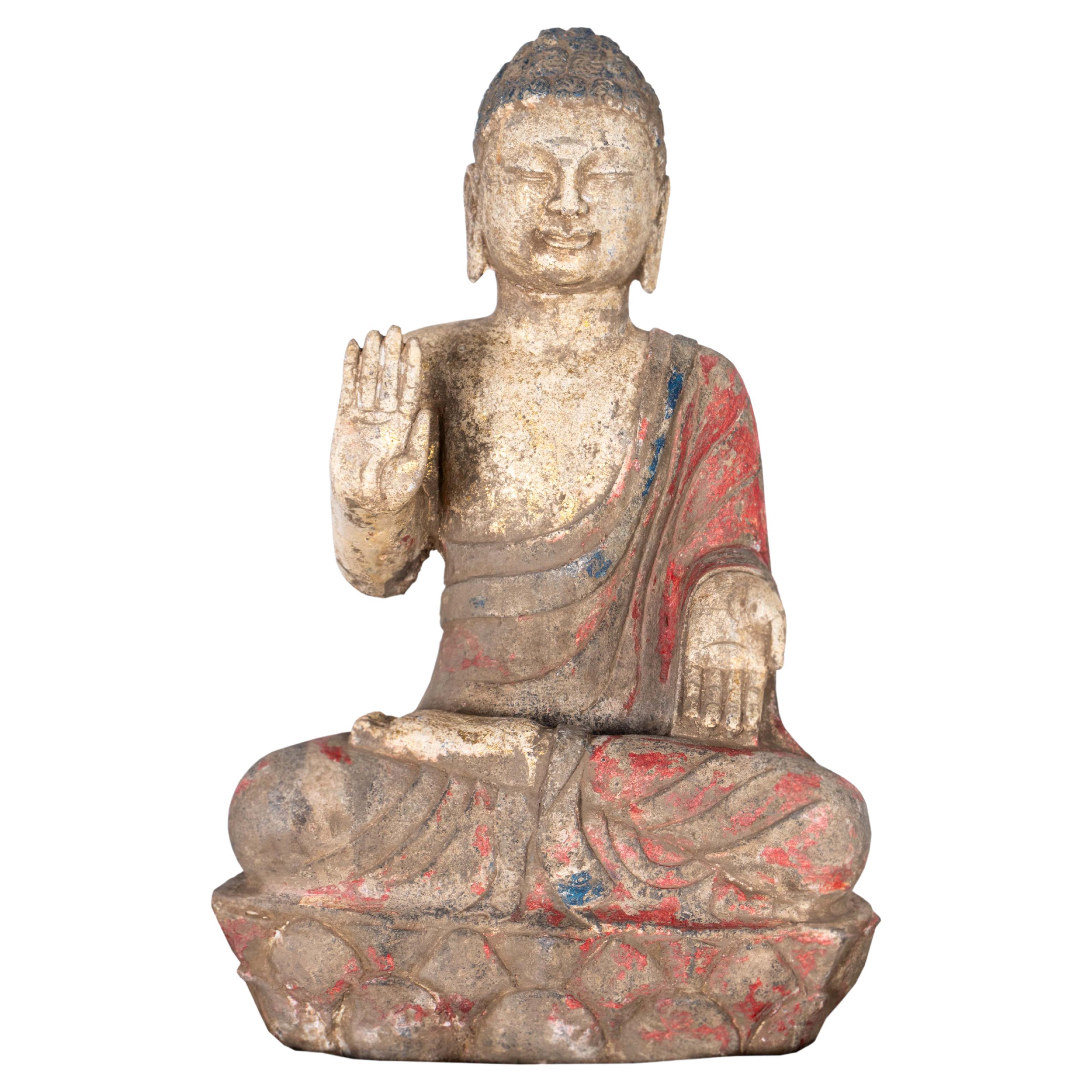 Stone Seated Buddha with Pigmented Decoration