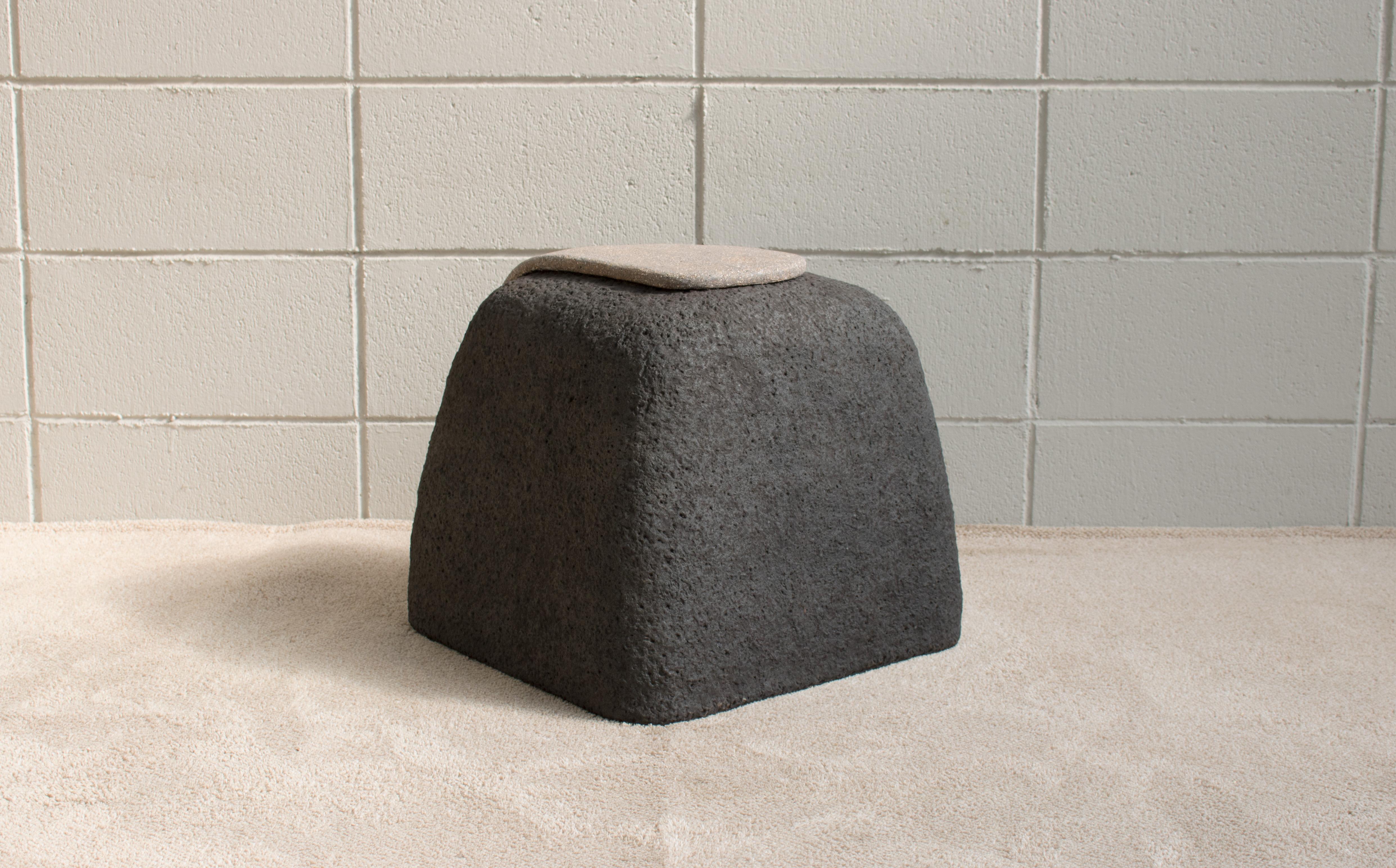 A stool with the touch of the stone texture. The clay was piled up in a basic manner, and the stone was stamped on the clay using a real stone to express the texture of the soil. The work was carried out only through the process of the firing so