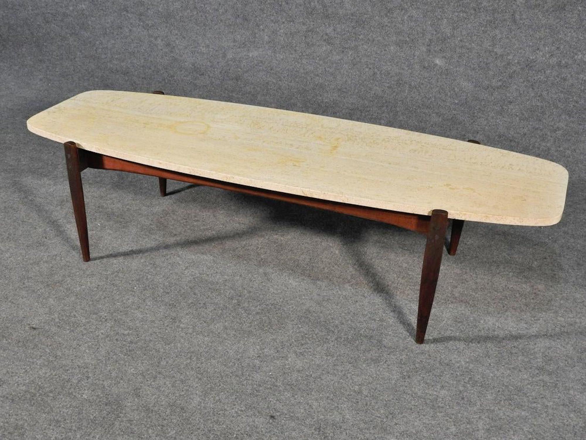 Mid-Century Modern wood table with travertine top.
(Please confirm item location - NY or NJ - with dealer).
 