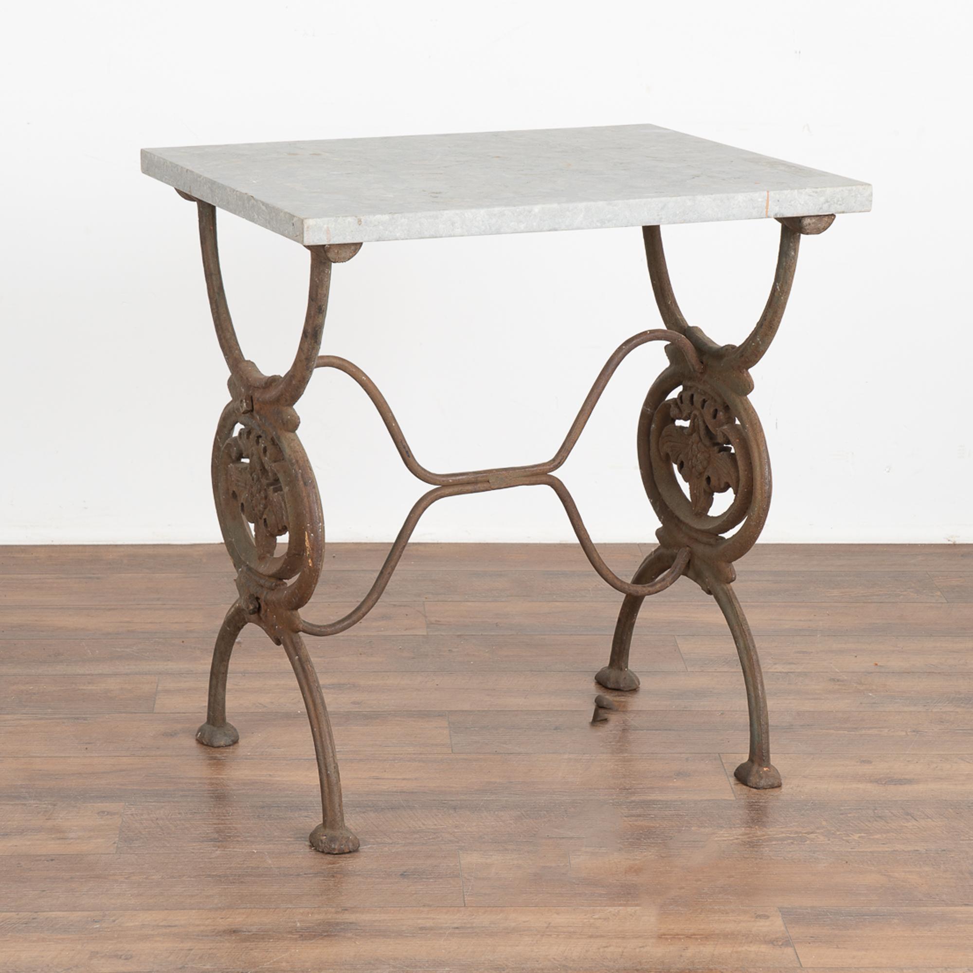 Stone top iron side table, perfect for outdoor space or unique interior accent table. Please enlarge photos to appreciate the beauty of the stone top. 
Strong, stable, ready to place and enjoy. Any cracks, discoloration, signs of wear are a