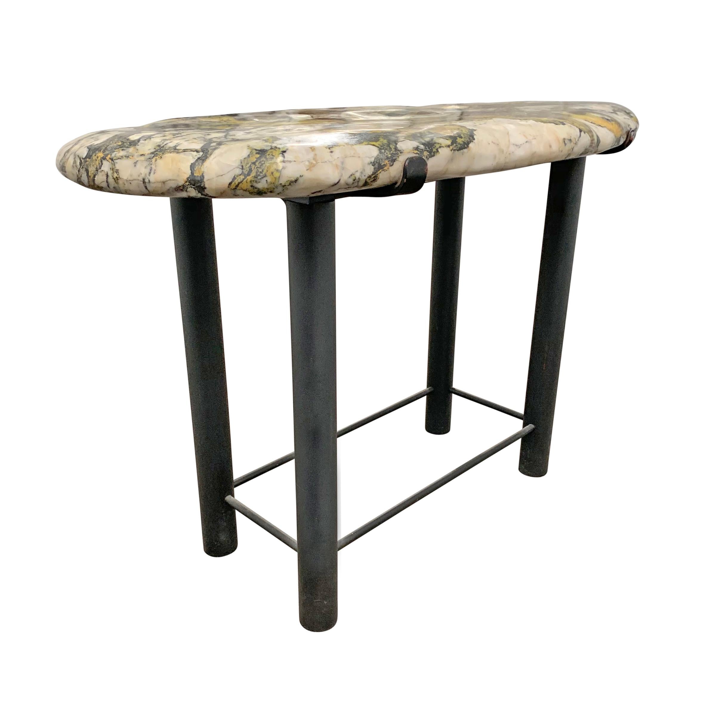 A wonderful custom made side table with a beautiful marble stone top mounted on a steel frame.