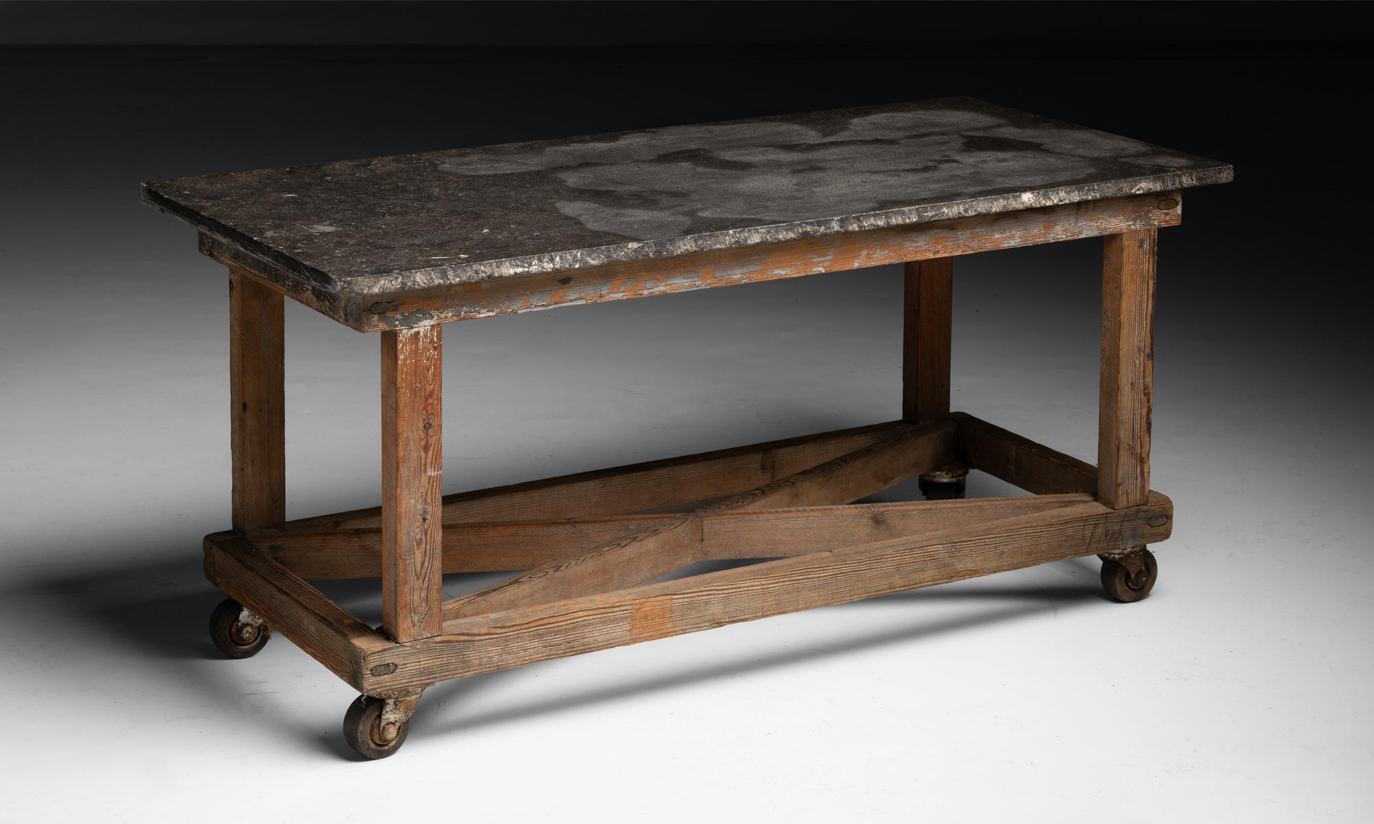 Stone Top Work Table

England circa 1900

Weathered blue stone top on pine base with castors.

51.5”L x 23.5”d x 24.25”h
