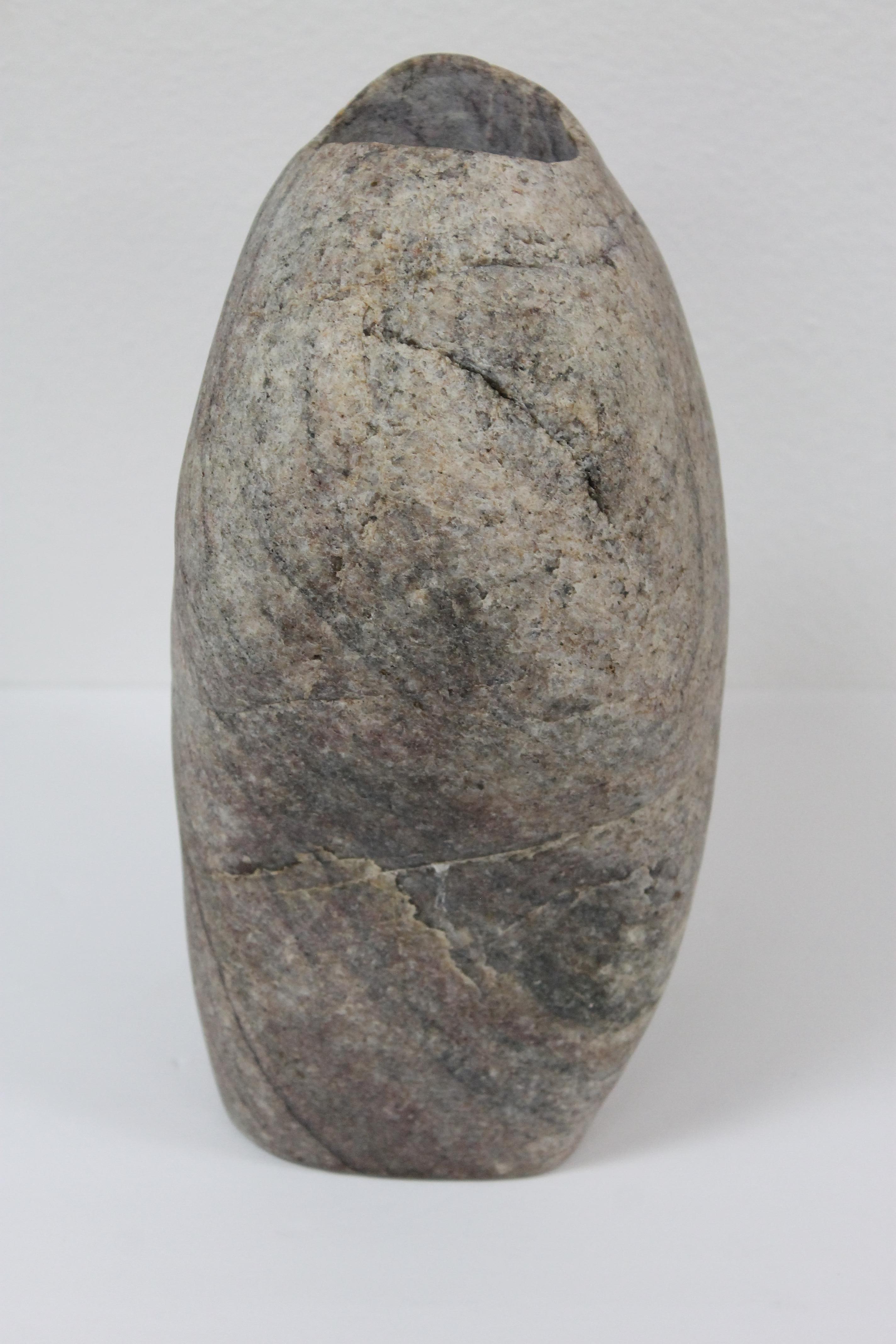 Solid stone vase. We've been using it for displaying flowers. Vase measures 8.5