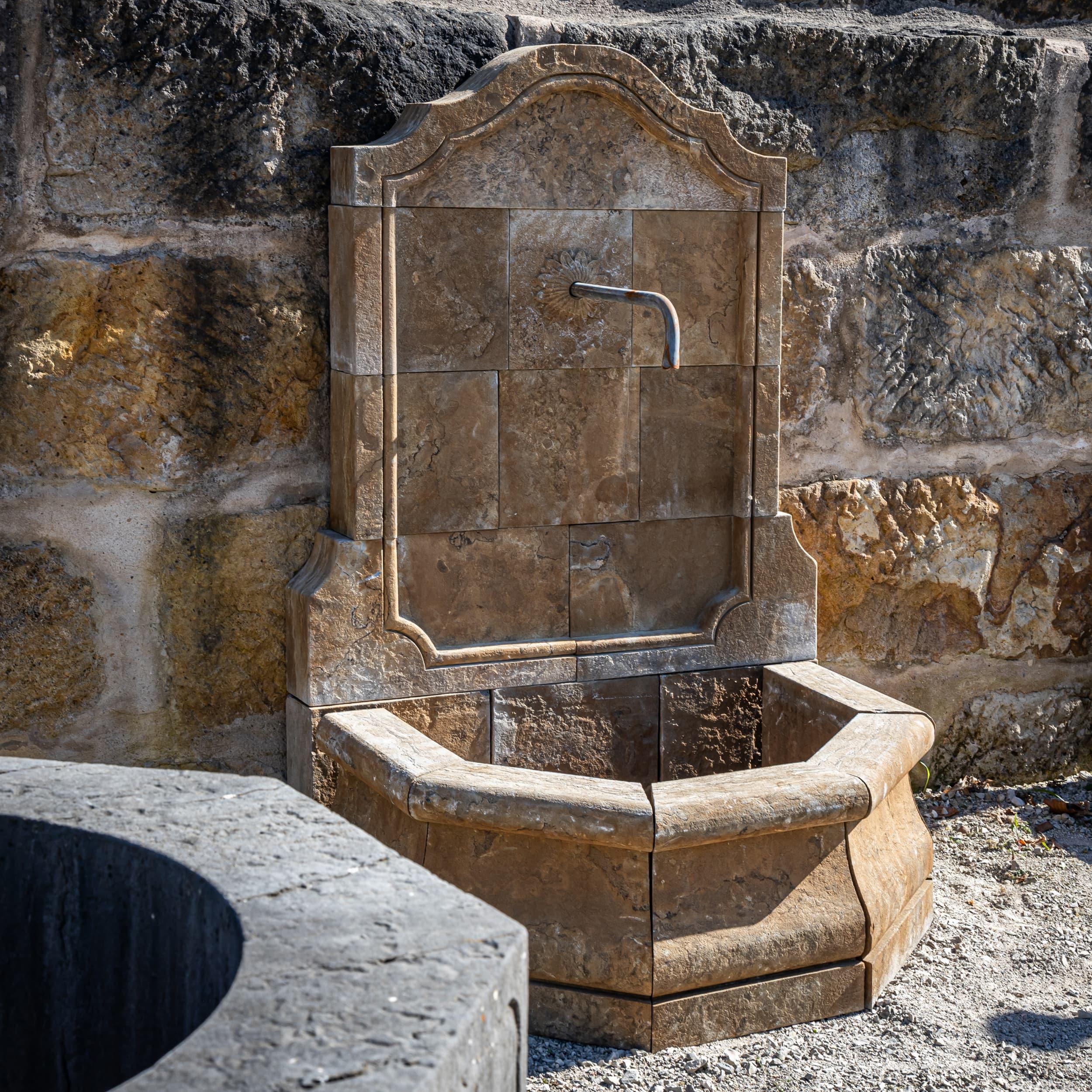 Hand-Carved Stone Wall Fountain in Renaissance Style, 21st Century For Sale