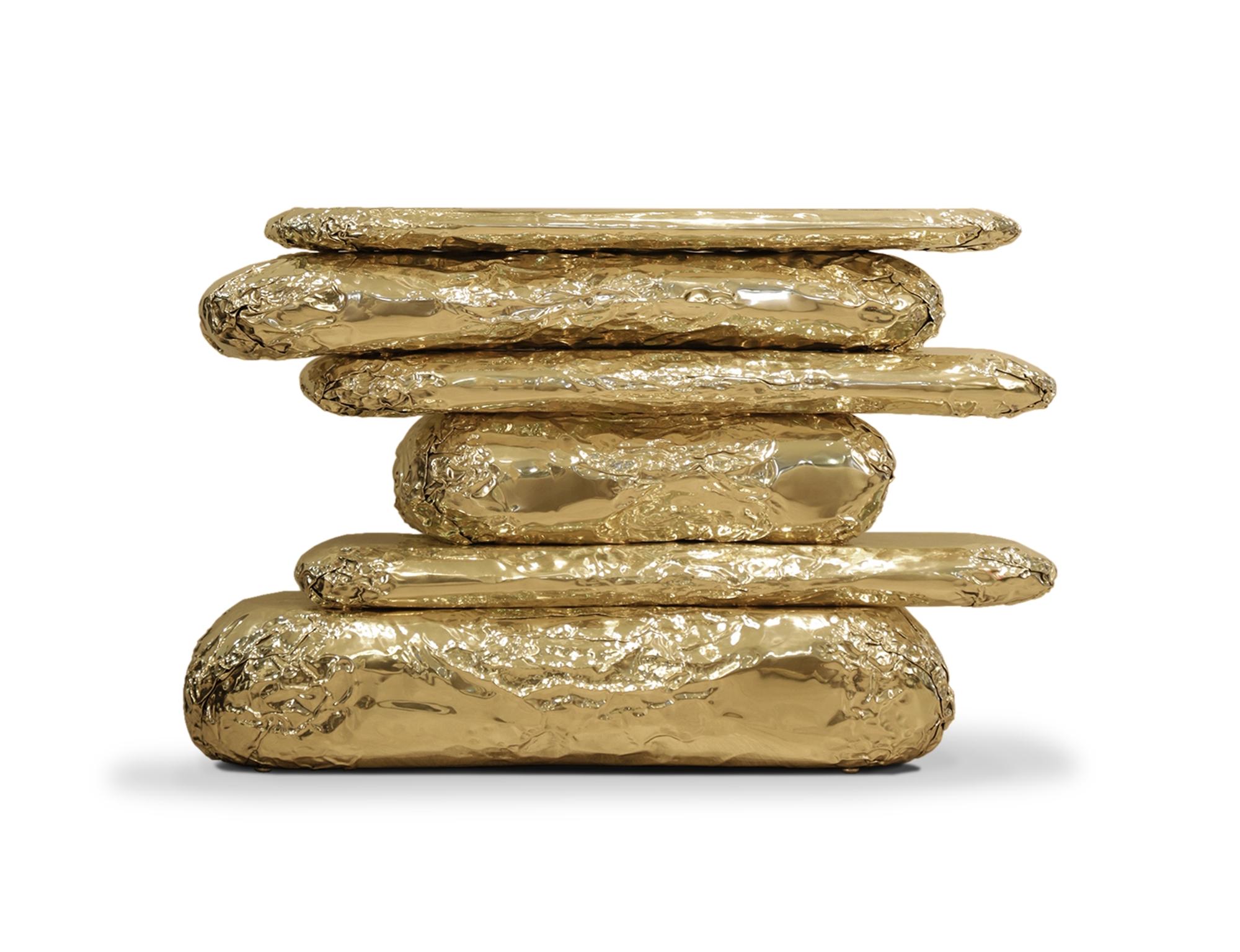 Finding inspiration in the prehistoric monument Stonehenge, positioned asymmetrically and composed by a striking finishes and materials –Brass and Marble. This piece promises to elevate your living space to the next level. The metallic hues make an