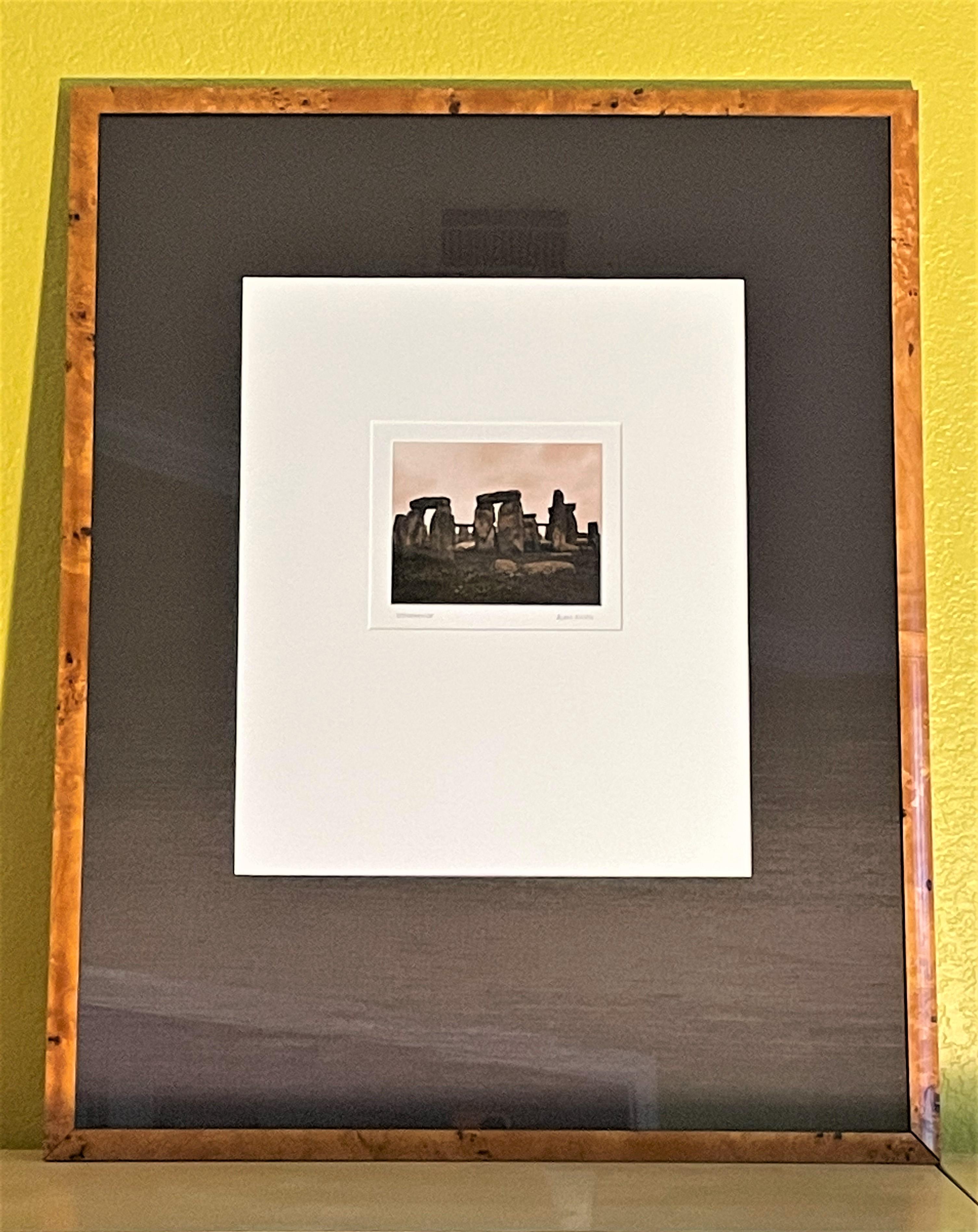 This image of Stonehenge by internationally acclaimed photographer, Alan Klug, represents his work before he transitioned to archival pigment ink printing, from true darkroom photography. This particular sepia image of Stonehenge is no longer