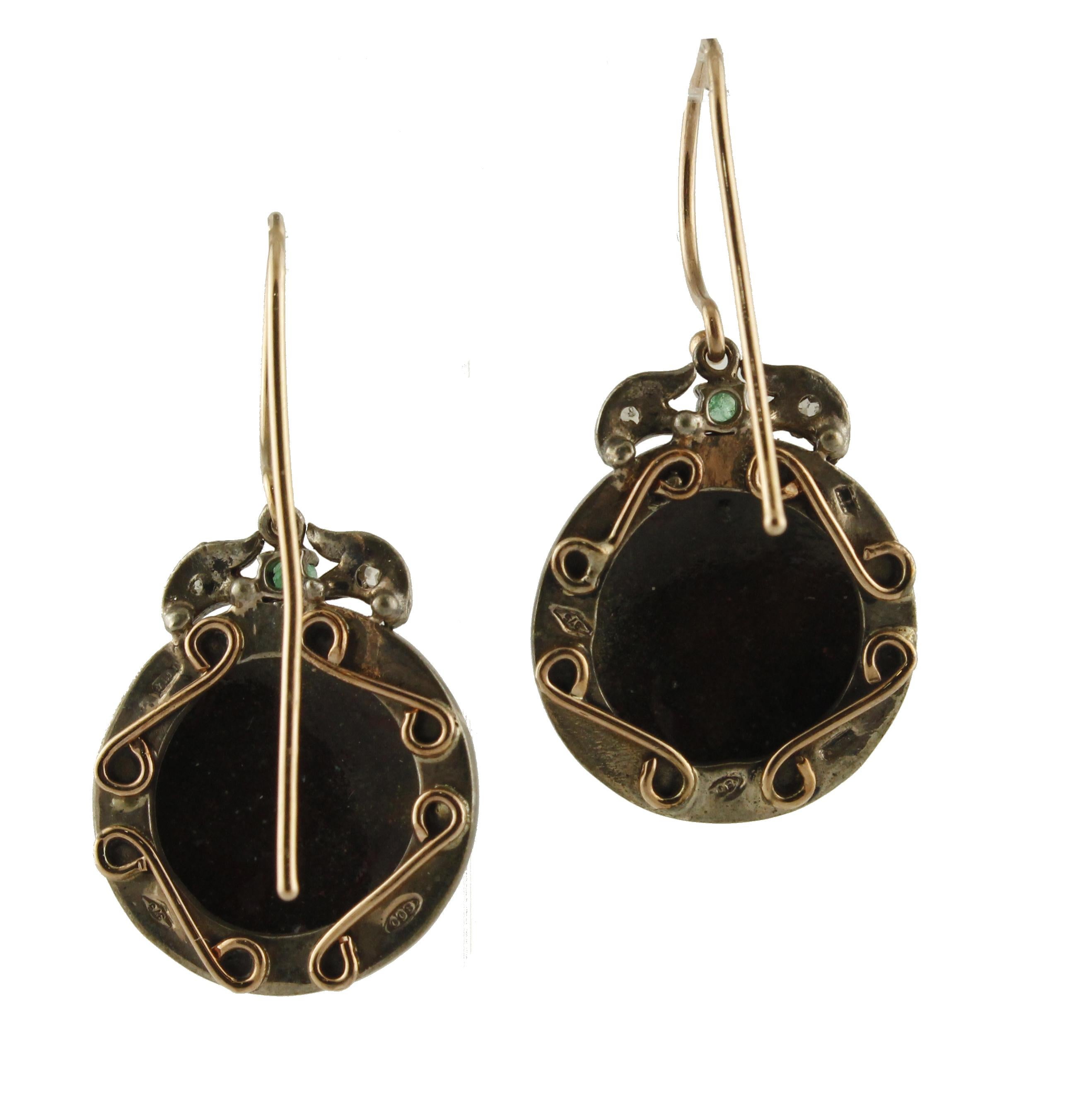 Beautiful and special earrings in 9 kt rose gold and silver, with hand-made miniature that represent Cupid, god of love, above this fabulous images there are diamonds and emeralds detailes
Diamonds ct 0.11
Emeralds ct 0.15
Stone with miniature g