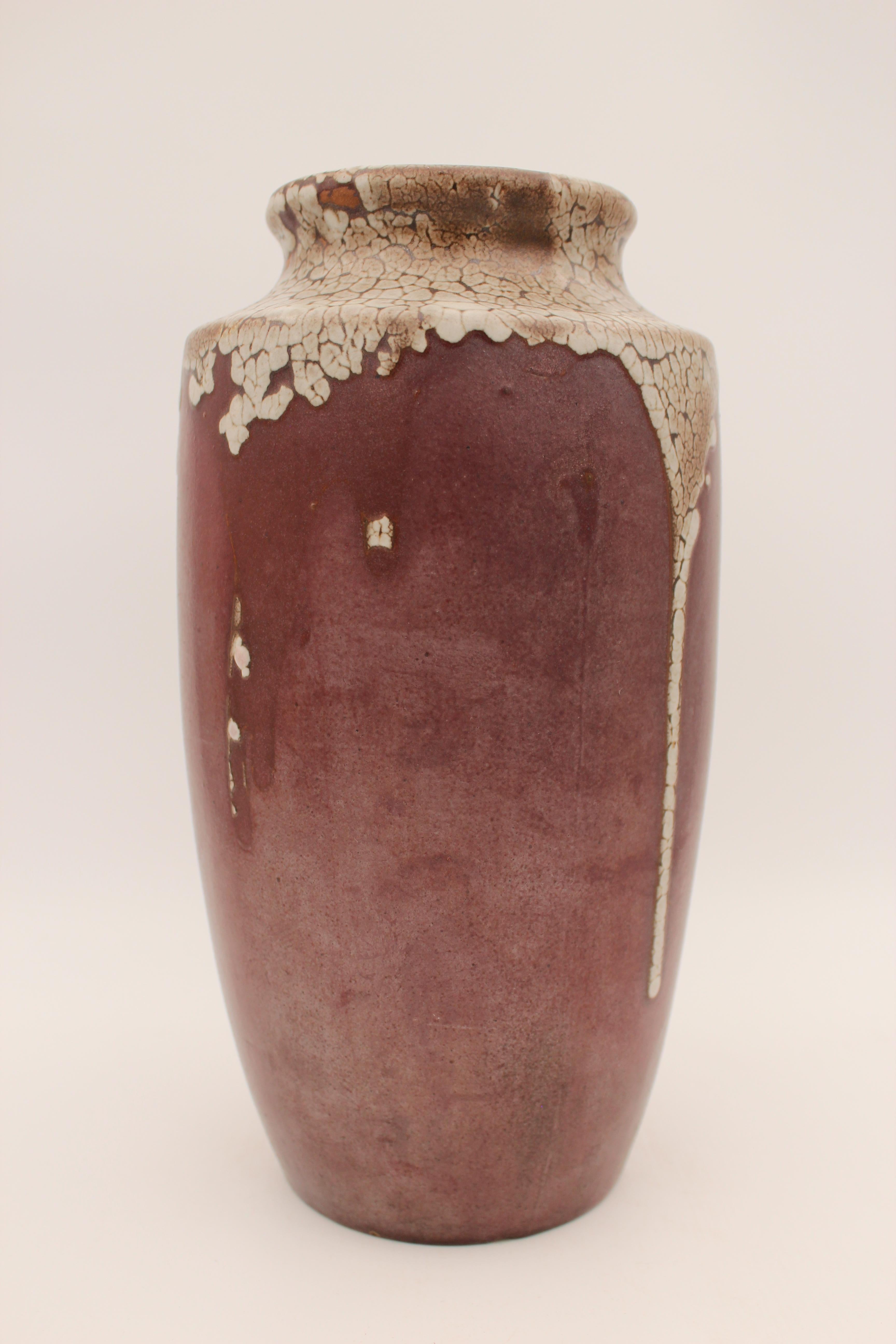 A beautiful stoneware vase of Japoniste inspiration, passed brown with a flowing cracked white drips, by the French art ceramist Leon Pointu (1879-1942), signed with incised signature ‘Pointu’.