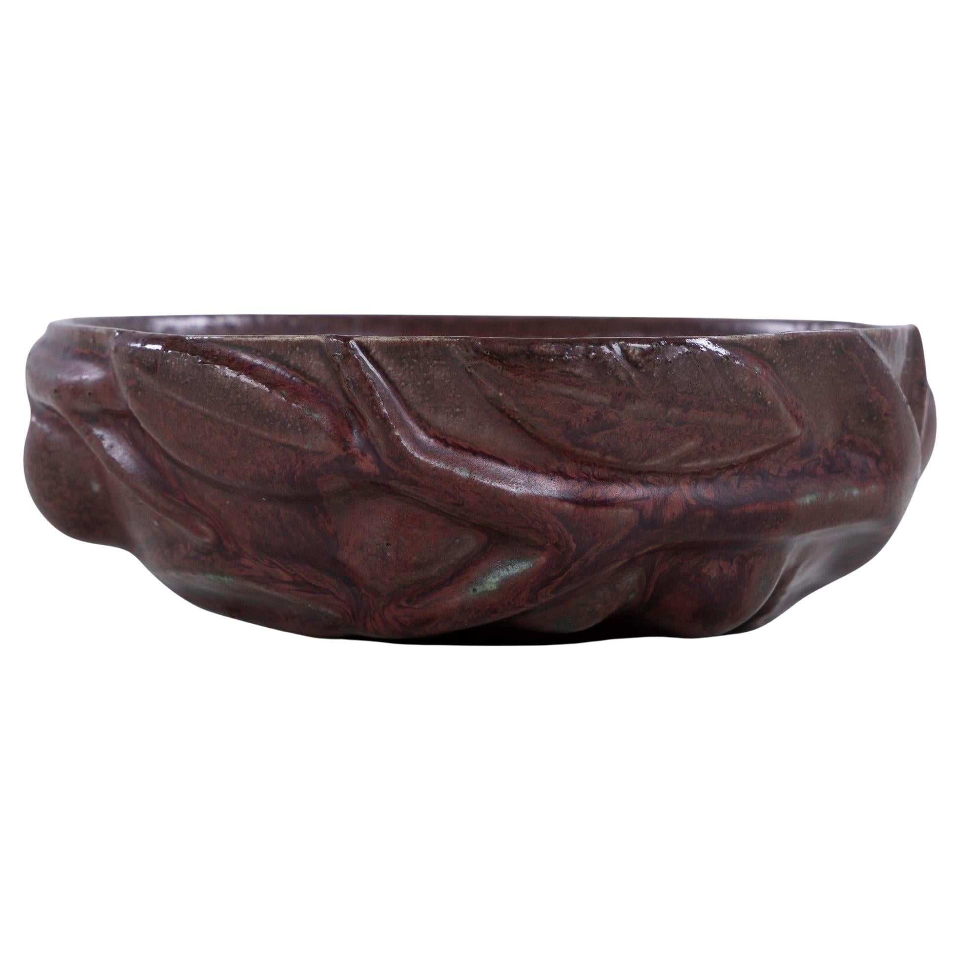 Stoneware bowl in oxblood glaze by Axel Salto