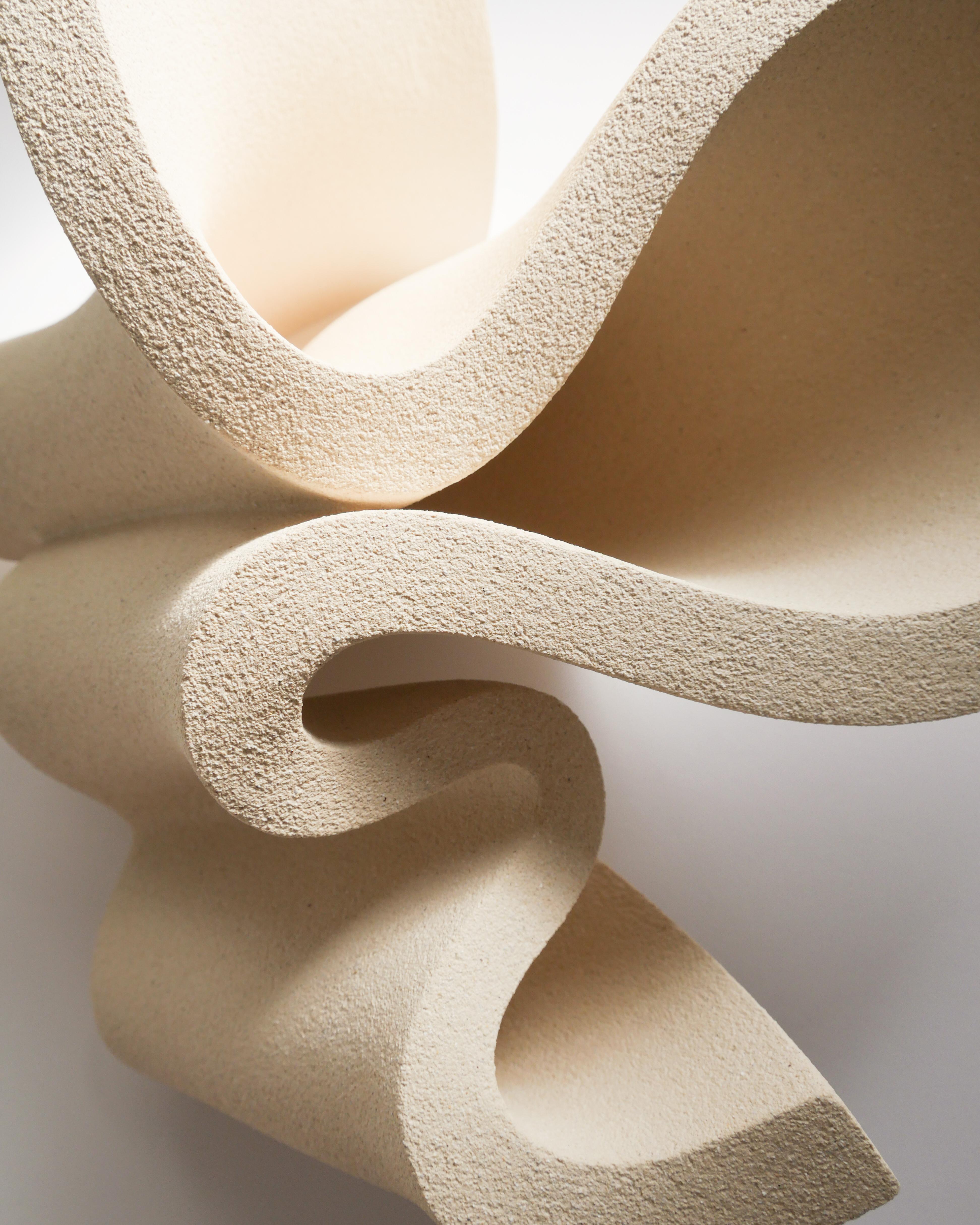 Stoneware Clay, Ribbon Vase II by Aleksandra Krasnopolska
Dimensions:  W 36 x D 30 x H 18 cm
Materials: Stoneware clay. Unglazed (notwatertight).
Weight: 5,4 kg.

Collection: The Wind of Change

Aleksandra Krasnopolska is a contemporary artist from