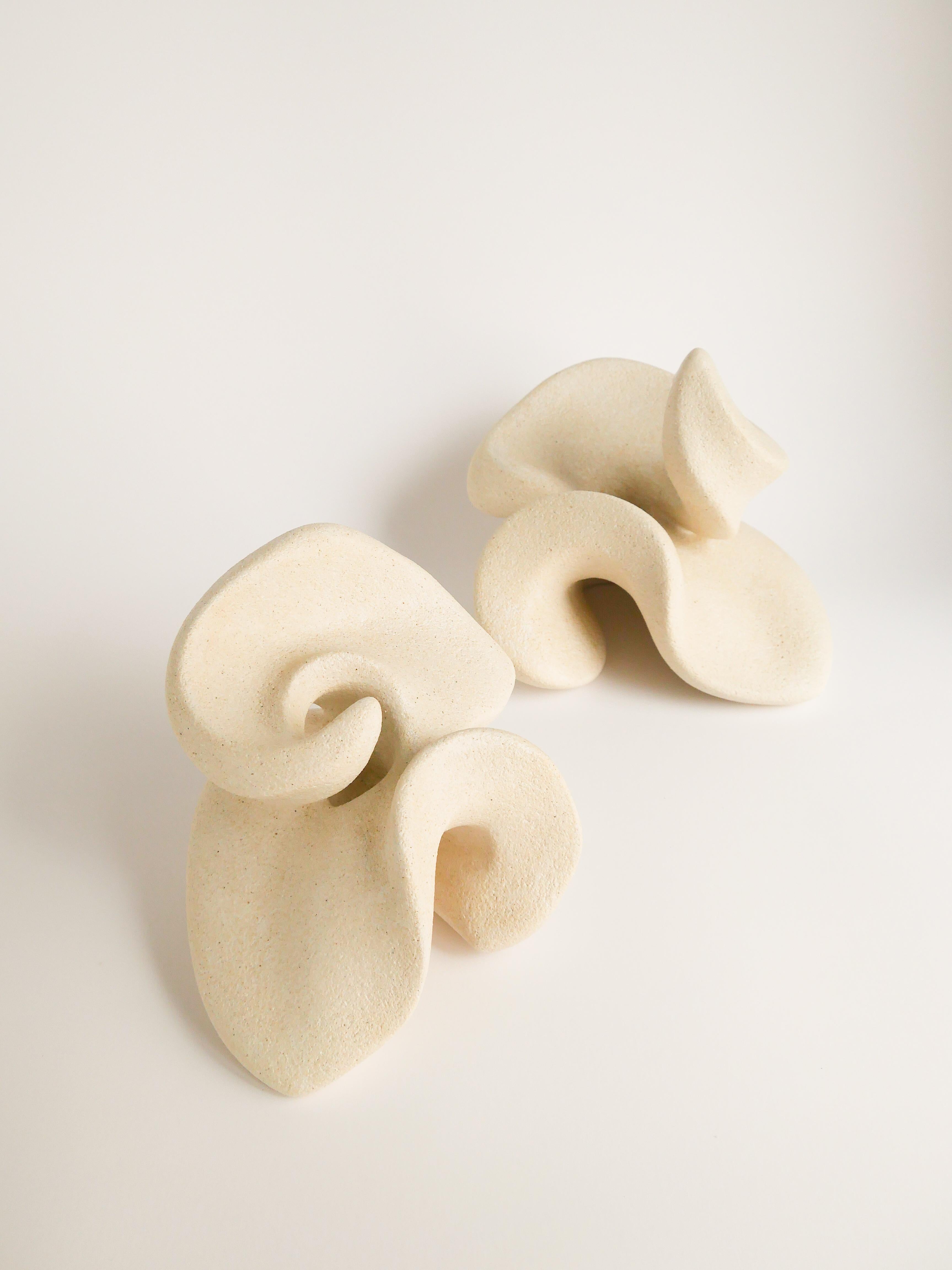 Stoneware Clay, Petals Candleholder by Aleksandra Krasnopolska
Dimensions:  W 16 x D 11.5 x H 11.5 cm, W 15 x D 13.5 x H 14 cm
Materials: Stoneware clay. Light glazewash appliedwith an airbrush.
Weight: 1,3 kg and 1.2 kg.


Aleksandra Krasnopolska