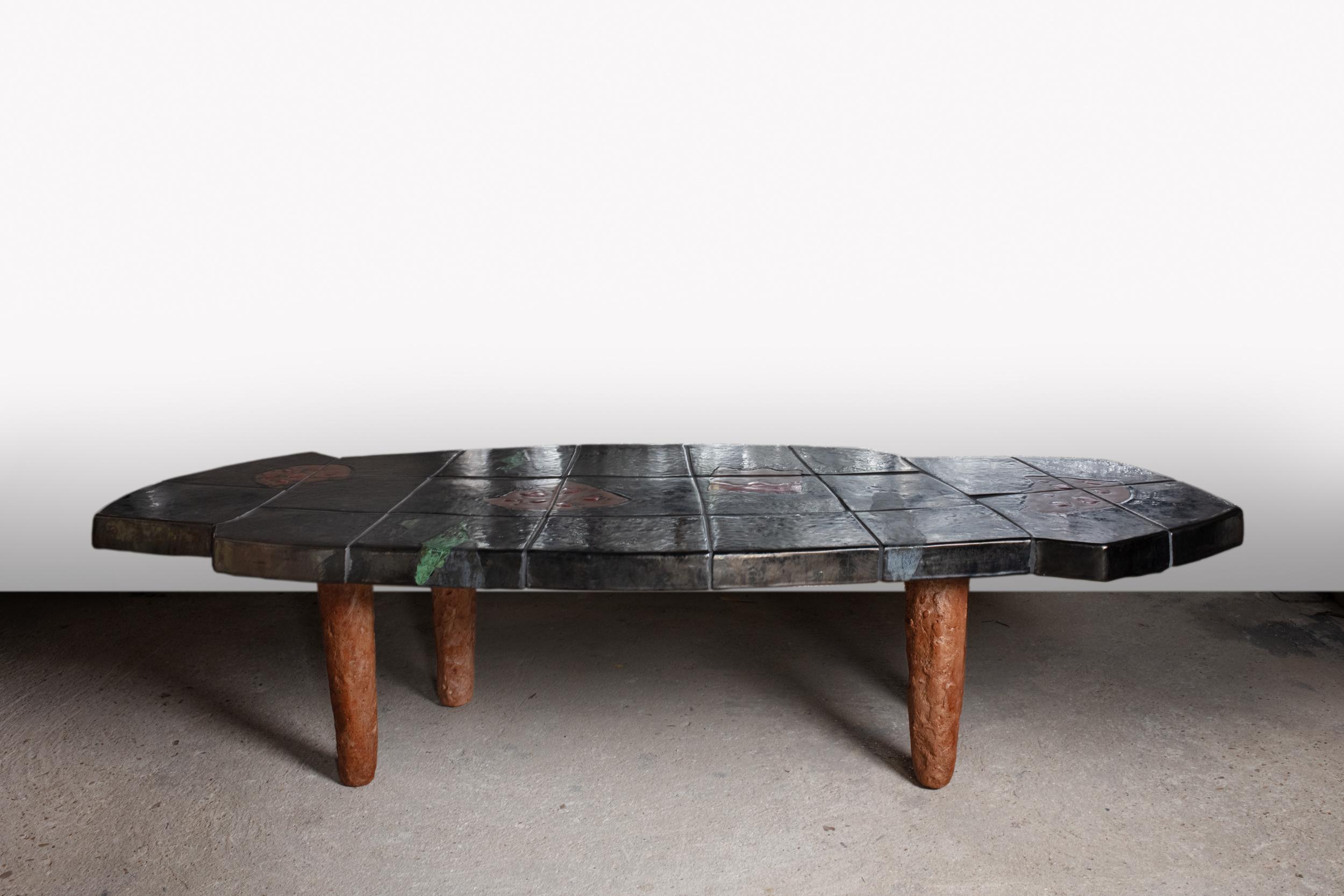 A ceramic coffee table with abstract glaze decoration by Jean-Pierre Viot.
Unique piece.
Signed.
The top and the bases are in ceramic.
2024.
H : 41 x 67x 169 cm  / 16' x 26.3' x 66.5'  inches.