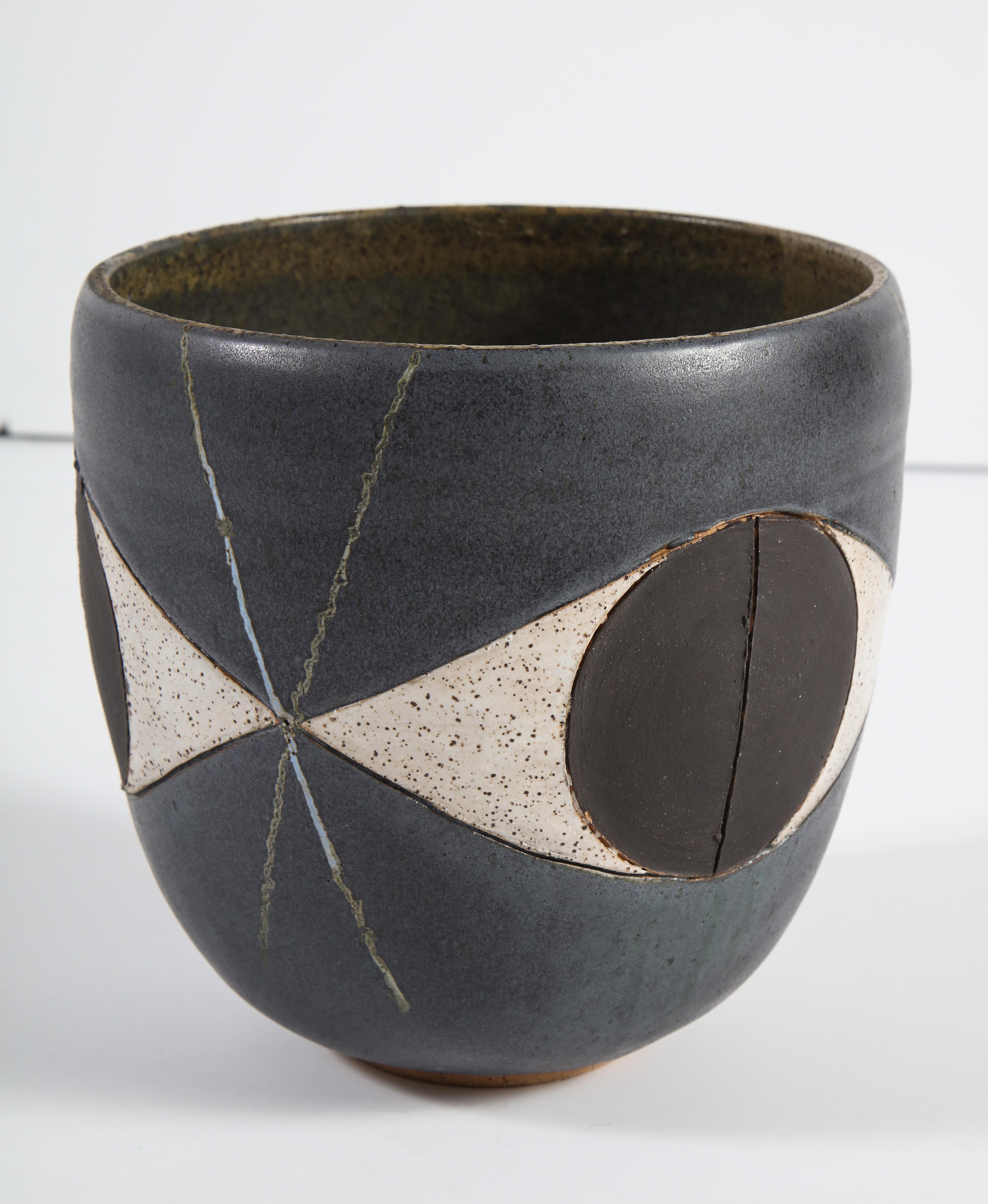 Matthew Ward is a graduate of the School of the Museum of Fine Arts in Boston. A self-taught ceramist, he draws inspiration from Post-War Studio Pottery as well as Art and Design from the midcentury. His work was included in the Clay Studio National