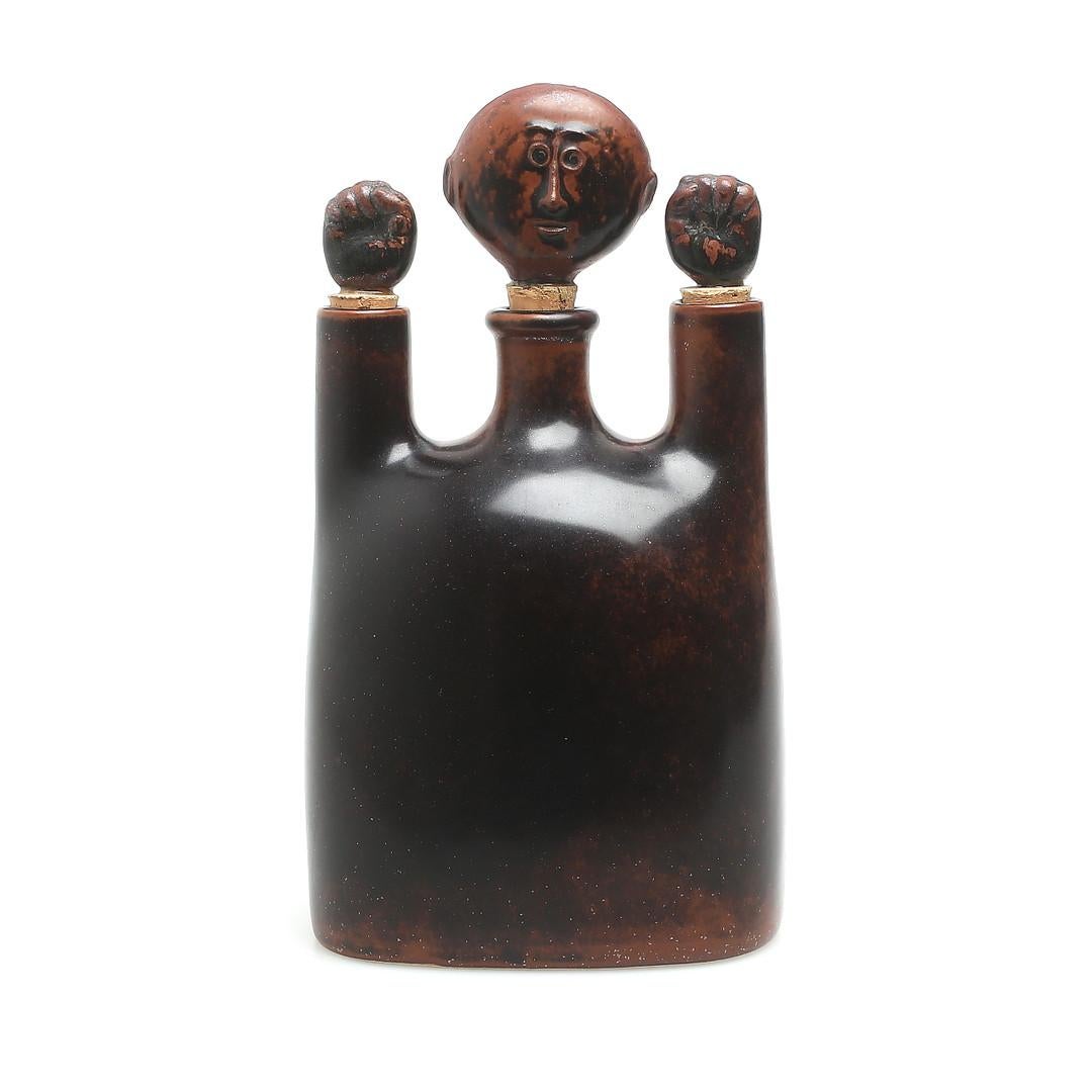 Stig Lindberg, (1916-1982)
Stoneware figure bottle for Gustavsberg studio, 1940s, Sweden
Signed.
   