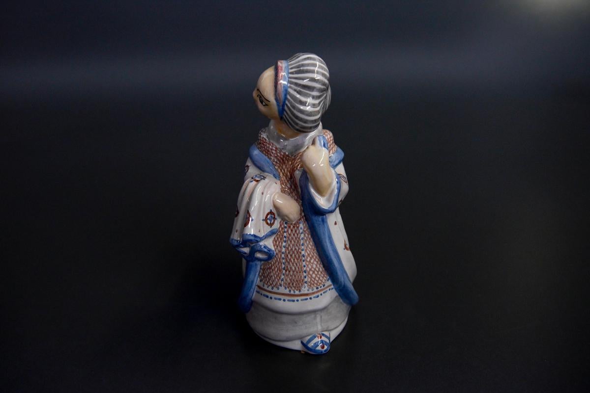 Stoneware figurine, hand painted by Danish L. Hjorth manufactory.