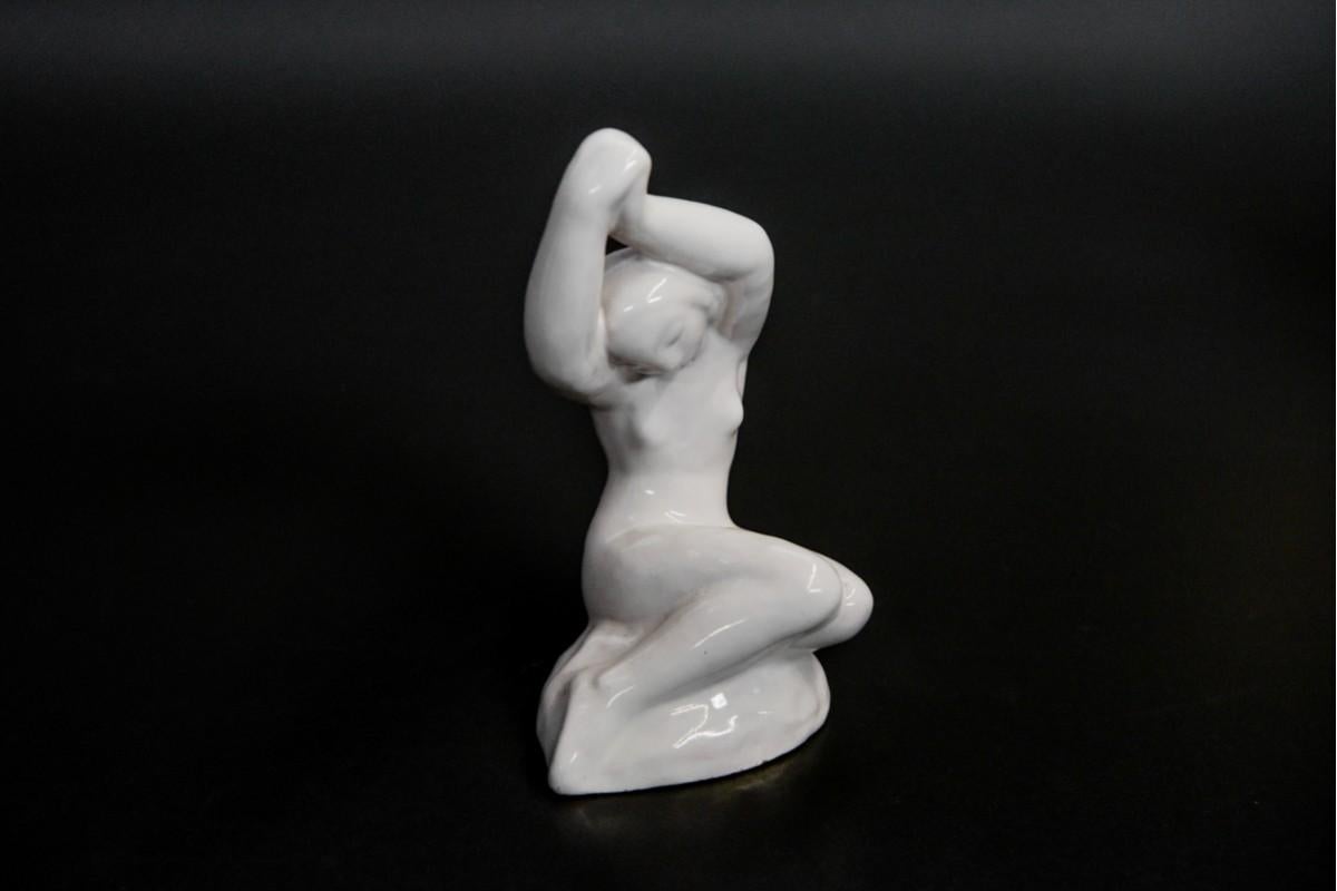 Stoneware figurine by L. Hjorth, Denmark.

Stoneware figurine, hand painted by Danish L. Hjorth manufactory. Number 573.