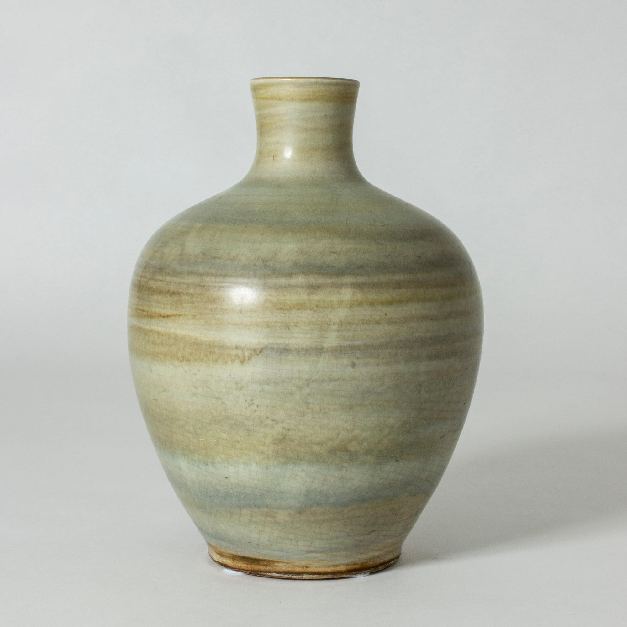 Stoneware floor vase by Gertrud Lönegren. Beautiful, subdued tones of nature grey and yellow in broad, diluted strokes around the body.