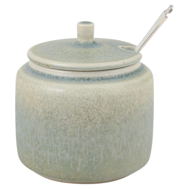 Stoneware jam jar with silver spoon. Palshus, Denmark, ca. 1960s. For Sale