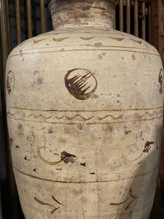 Stoneware jar with brown and beige glaze