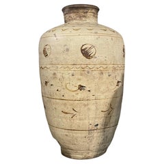 Stoneware jar with brown and beige glaze