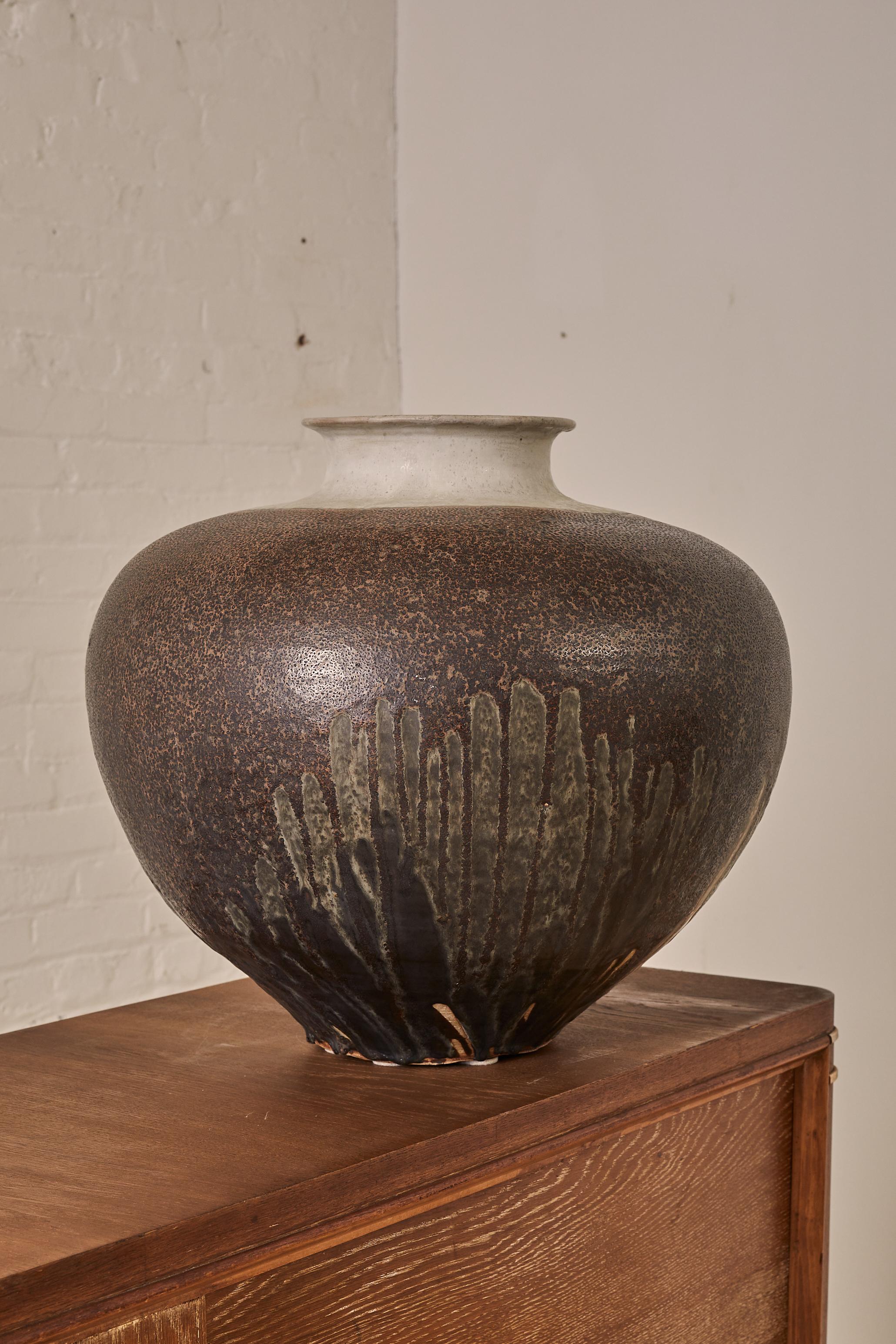 Stoneware Jardiniere by Paul Chaleff with a speckled glaze.  It is marked with the artist's incised signature and date (2005)

