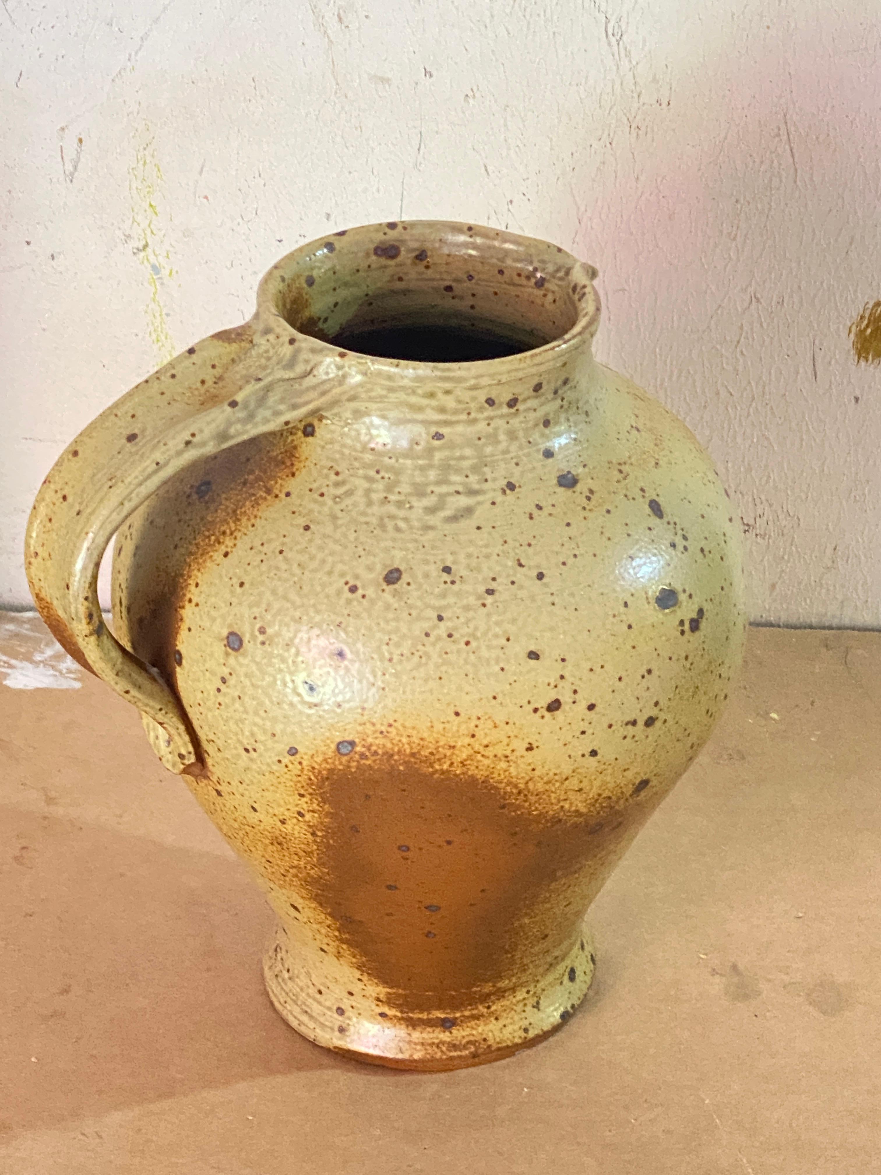 Jug or pitcher, with an exceptional patina. It's color with beige and brown gives very pleasant contrasts. This Pitcher was created in France in the 1960s.