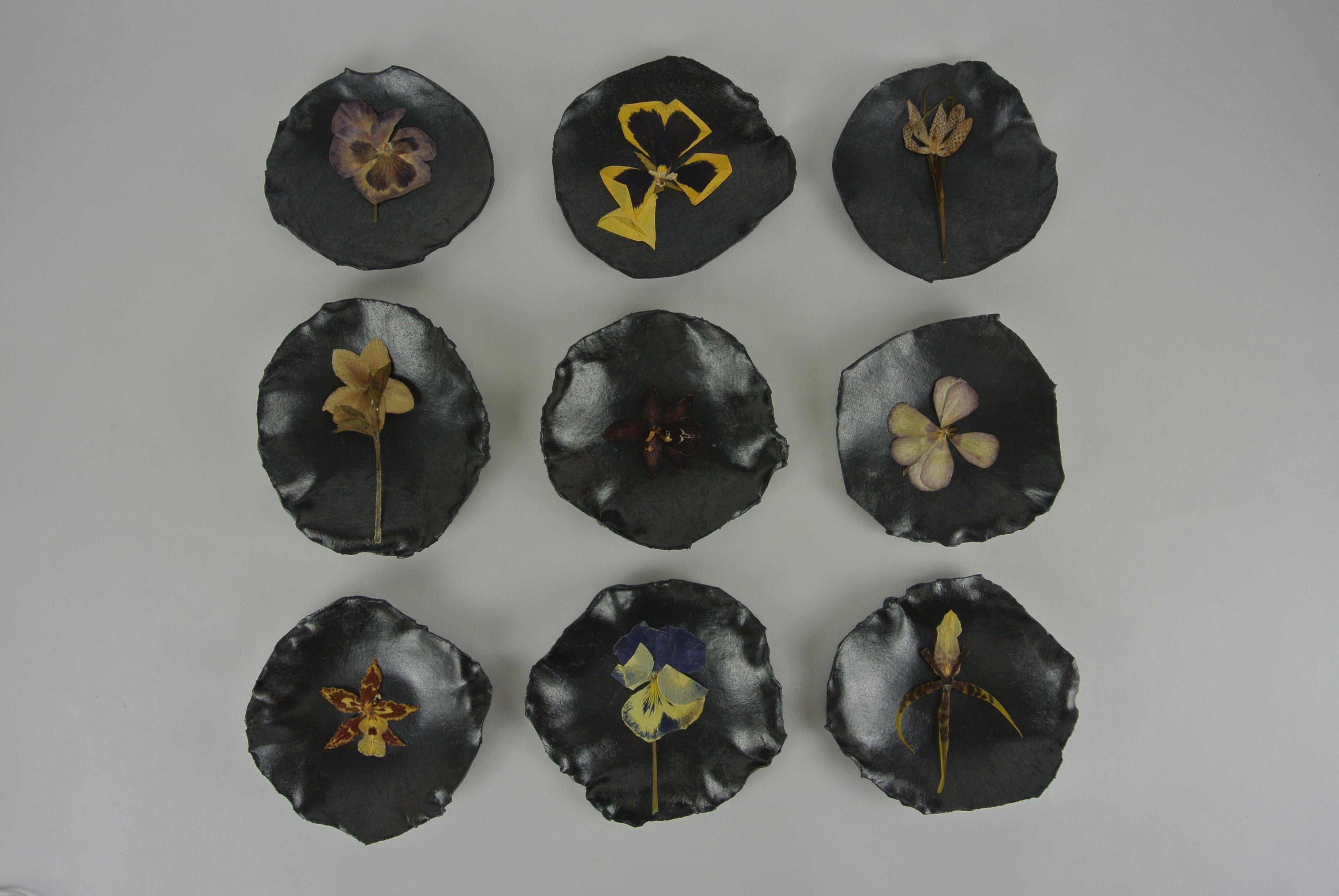 Red stoneware petal bowls by Christine Roland with black metallic glaze.
Individually pressed flowers by Mary Lennox Flowers as part of an ongoing collaboration. The bowl comes wrapped in a gift box. A larger quantity is in current production also